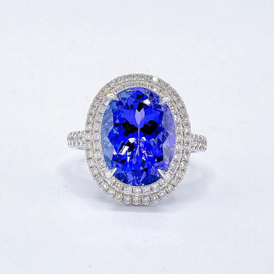 GRC Certified Vivid Blue 5.11 CT Tanzanite 18K Gold Ring with Diamonds

1 Oval Shape Tanzanite - 5.11 CT
Color : Vivid Blue
Dimensions : 12.23 * 9.16 * 6.67 mm

GRC Certification Attached

Diamonds - 0.54 CT
18K Gold - 5.81 GM