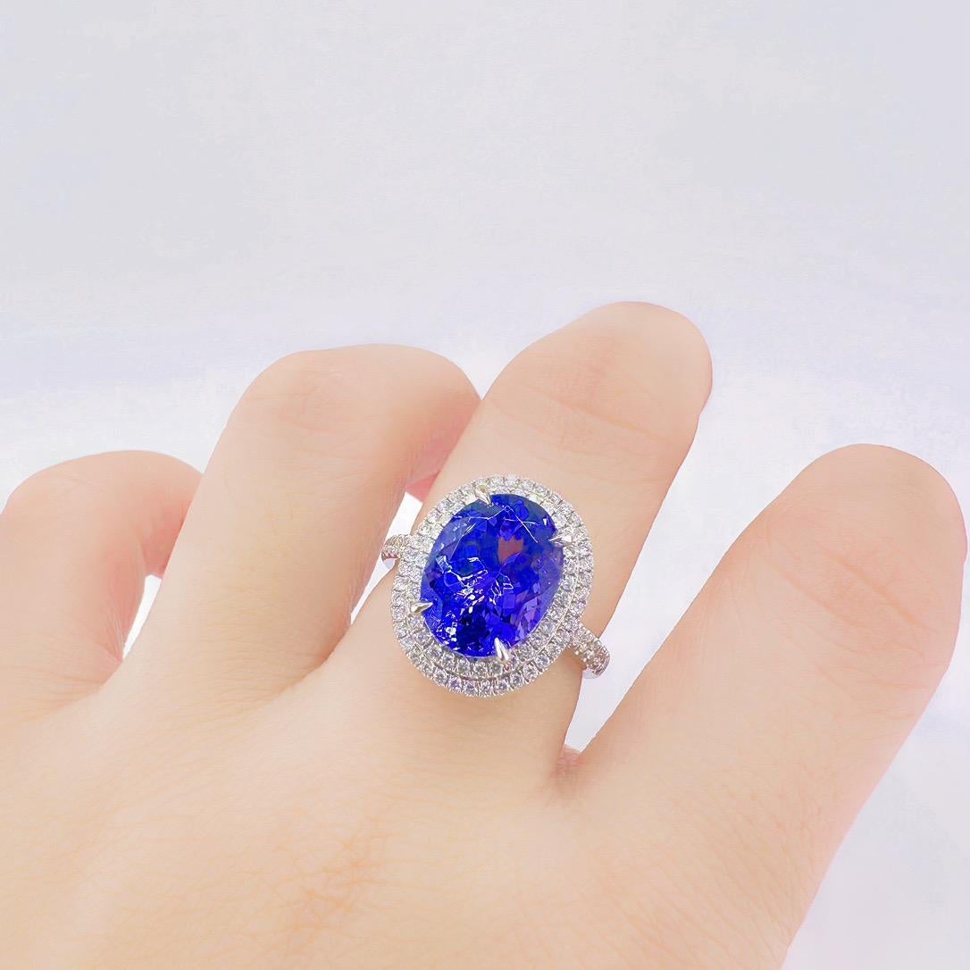 Oval Cut GRC Certified Vivid Blue 5.11 CT Tanzanite 18K Gold Ring with Diamonds For Sale