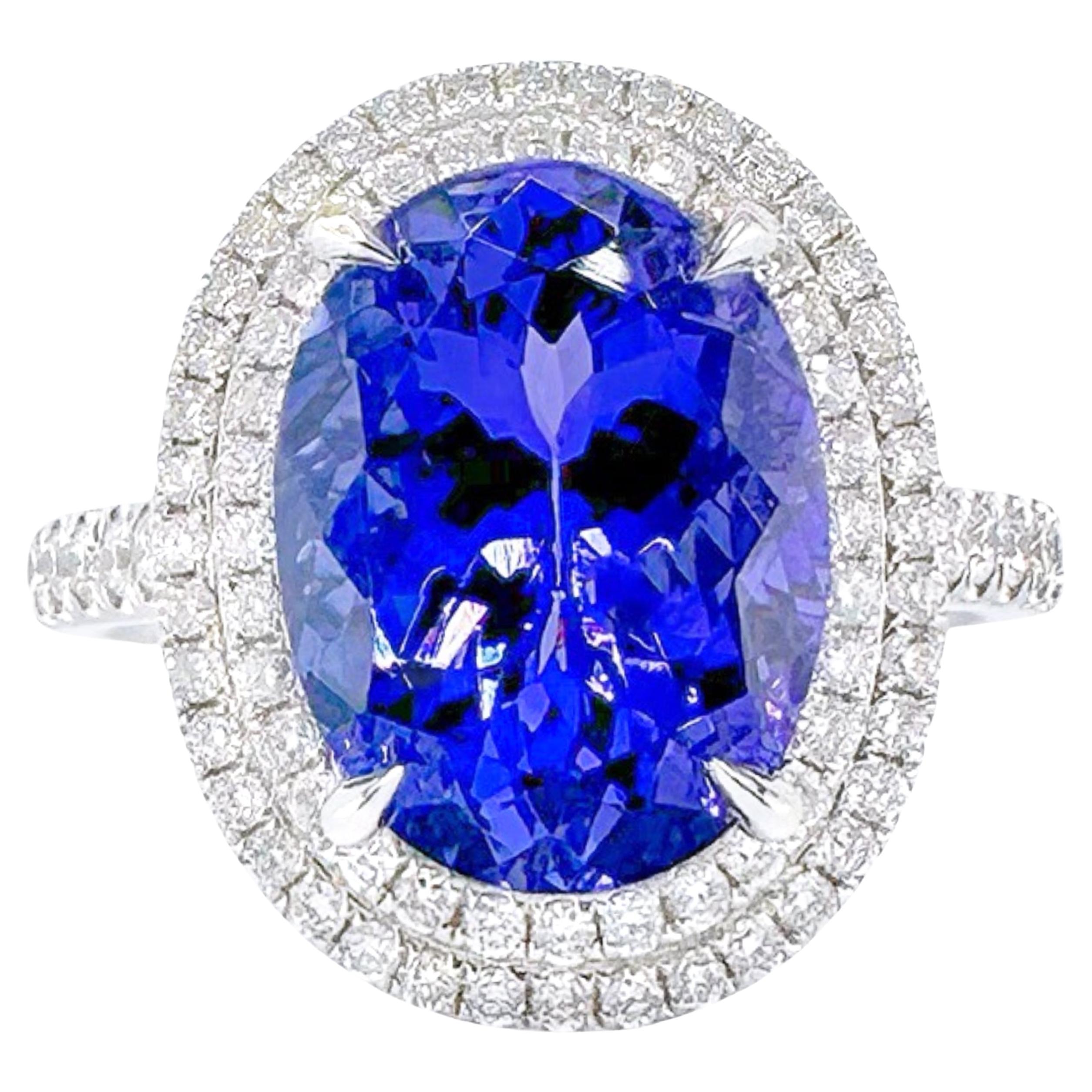 GRC Certified Vivid Blue 5.11 CT Tanzanite 18K Gold Ring with Diamonds For Sale