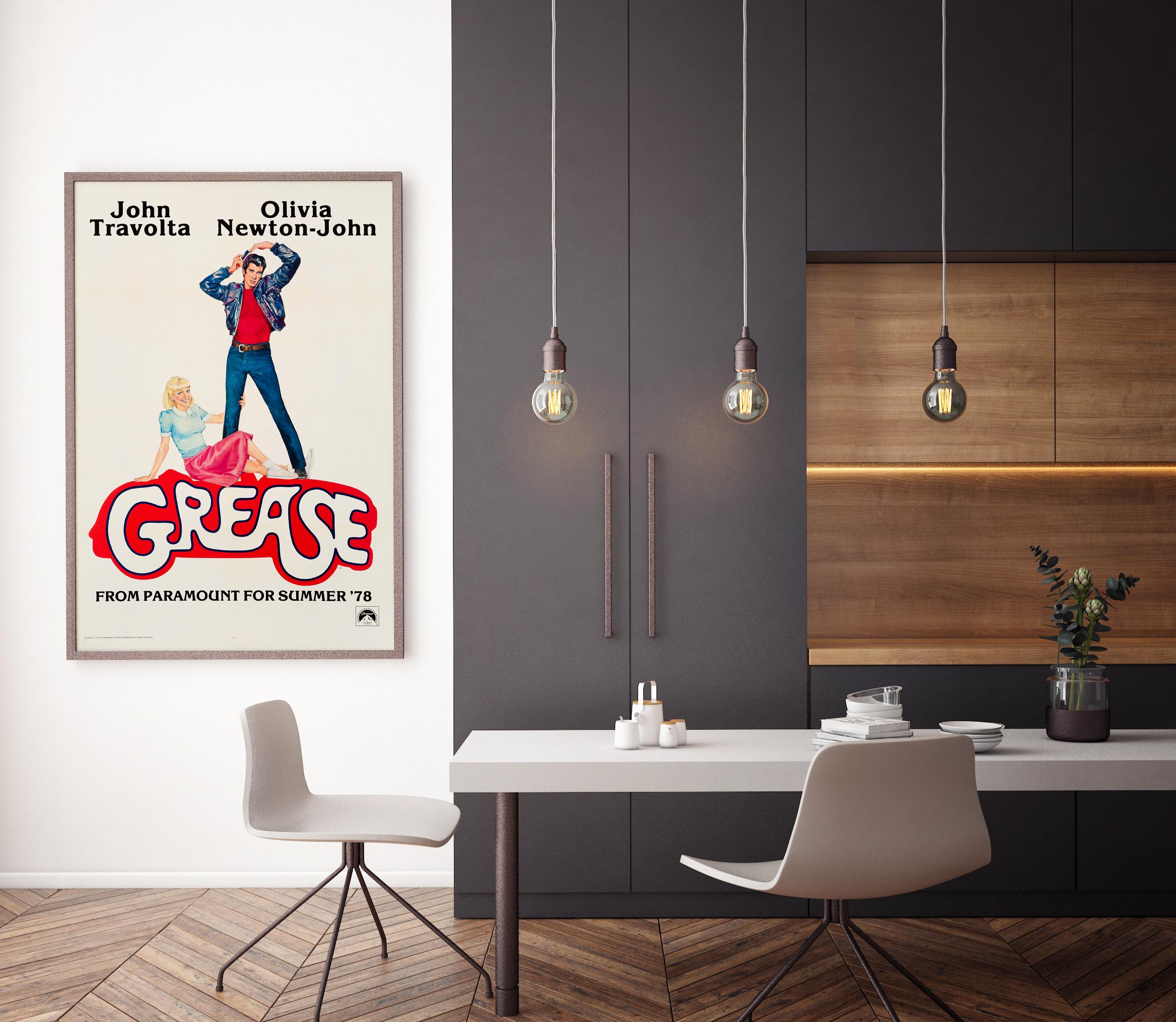 This rare US One Sheet poster with a delightfully peppy design by Linda Fennimore was released for the teaser campaign ahead of the summer 1978 theatrical release of Paramount's blockbuster musical romance 'Grease.' Based on the Broadway musical of