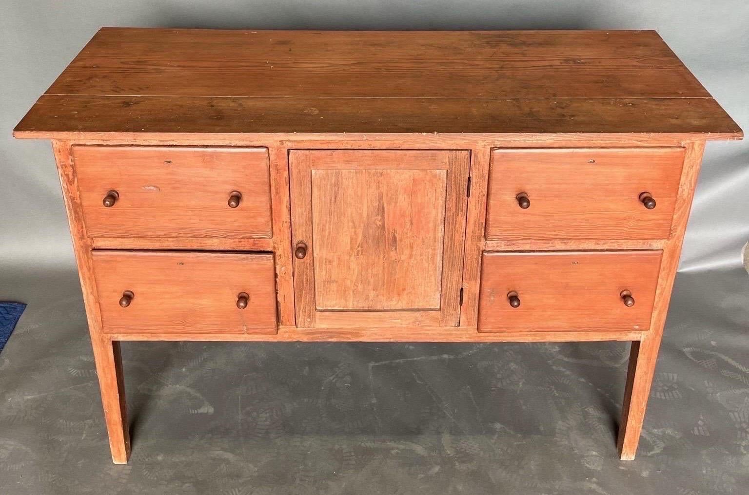 Great 19th century North Carolina yellow pine huntboard in original red paint. Recovered from a historic home in Carolina County, VA