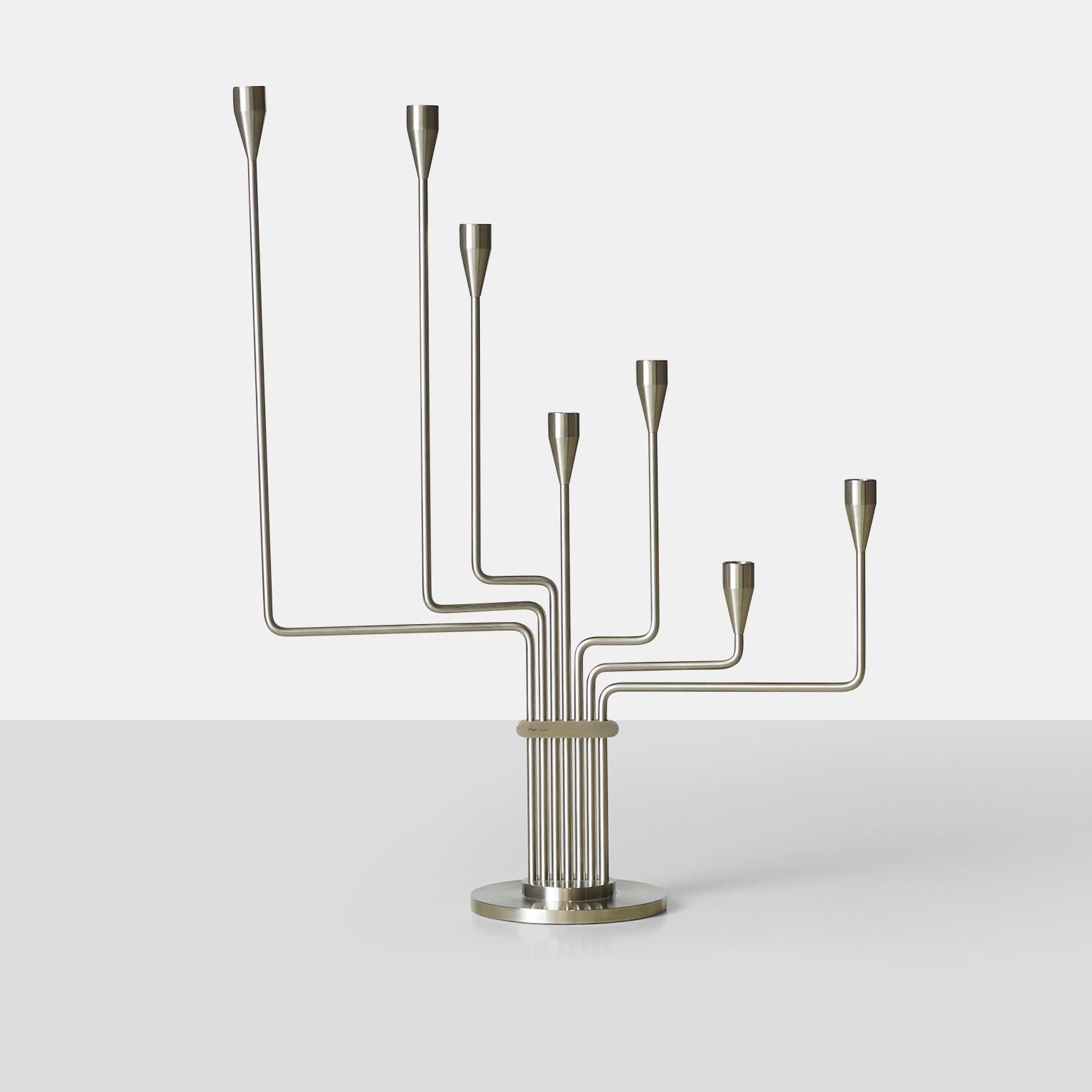 A Piet Hein candelabra in brushed steel. Known as either “Big Dipper” or “The Great Bear”, it was designed by Hein during his time in Argentina to remind him of his home in Denmark. The arms of the candelabra are adjustable.