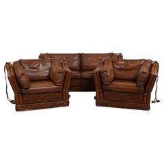 Great complete set of cognac-colored cow leather castle sofa and armchairs