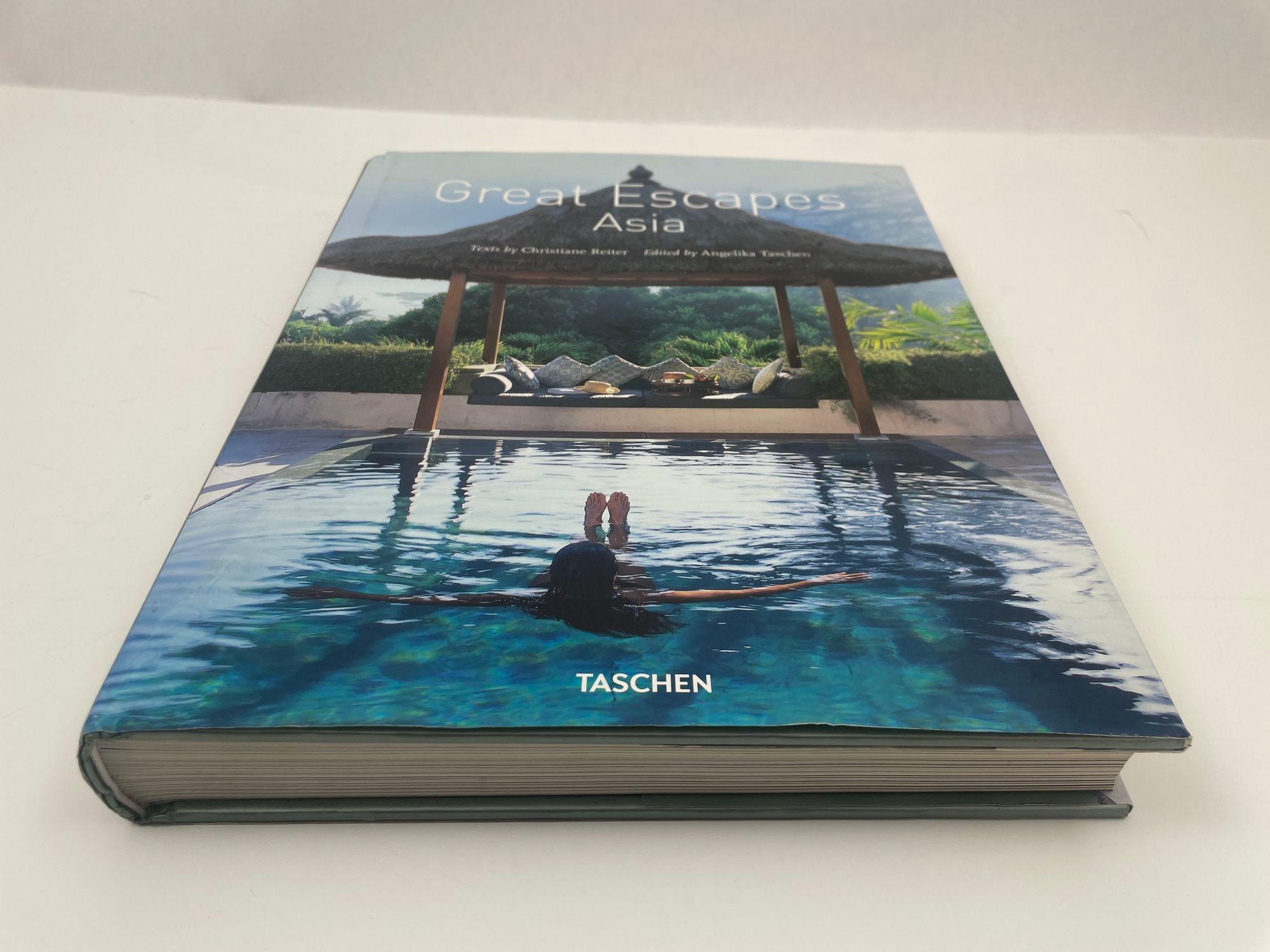 Great Escapes Asia Hardcover Table Book by Taschen Publishing.
Asia promises multisensory marvels. Whether it’s a scorching hot curry, the vivid sounds of a local market, or an expert massage in a haven of feng-shui calm, the world’s largest