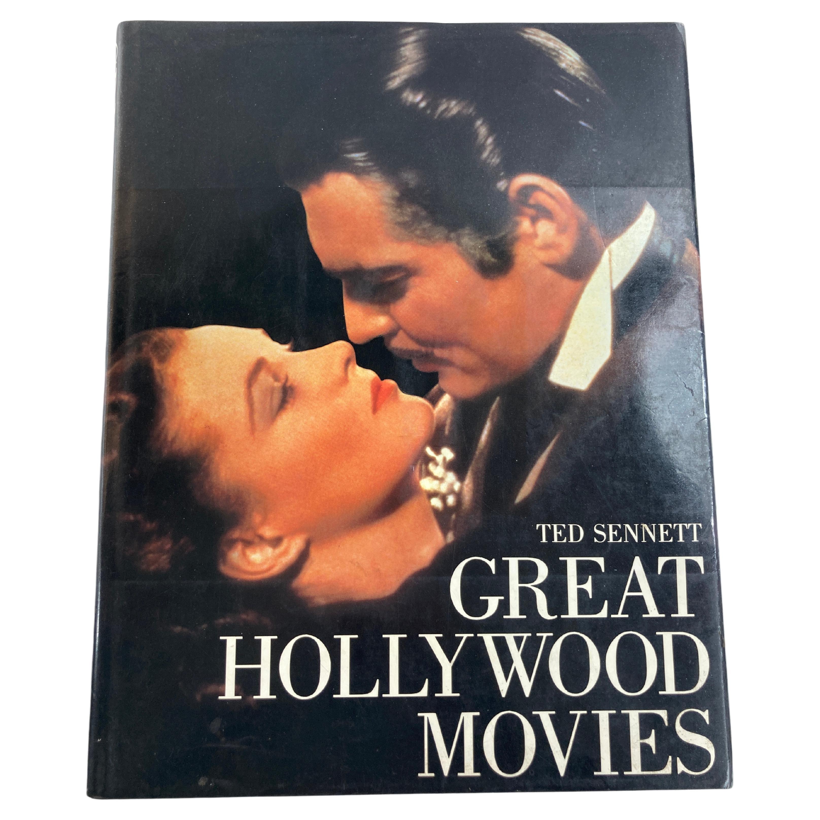 Great Hollywood Movies by Ted Sennett Hardcover Book 1st Ed. 1983.
Large vintage hardcover vintage coffee table.
A celebration of Hollywood's finest films, from the silent screen era to the present, documents outstanding comedies, war movies,