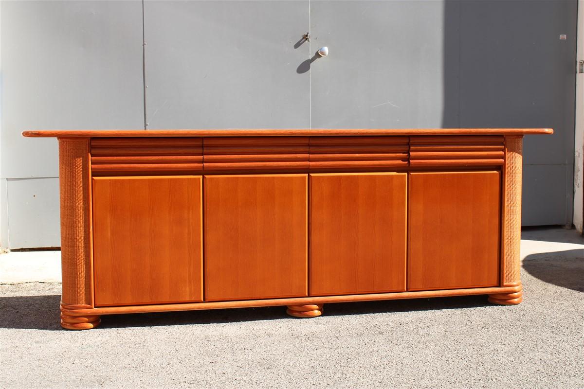 Great Italian Design Roberti 1970s Sideboard in Rattan Bamboo, consisting of 4 doors and four drawers, the top very spacious, 1960s Italy.