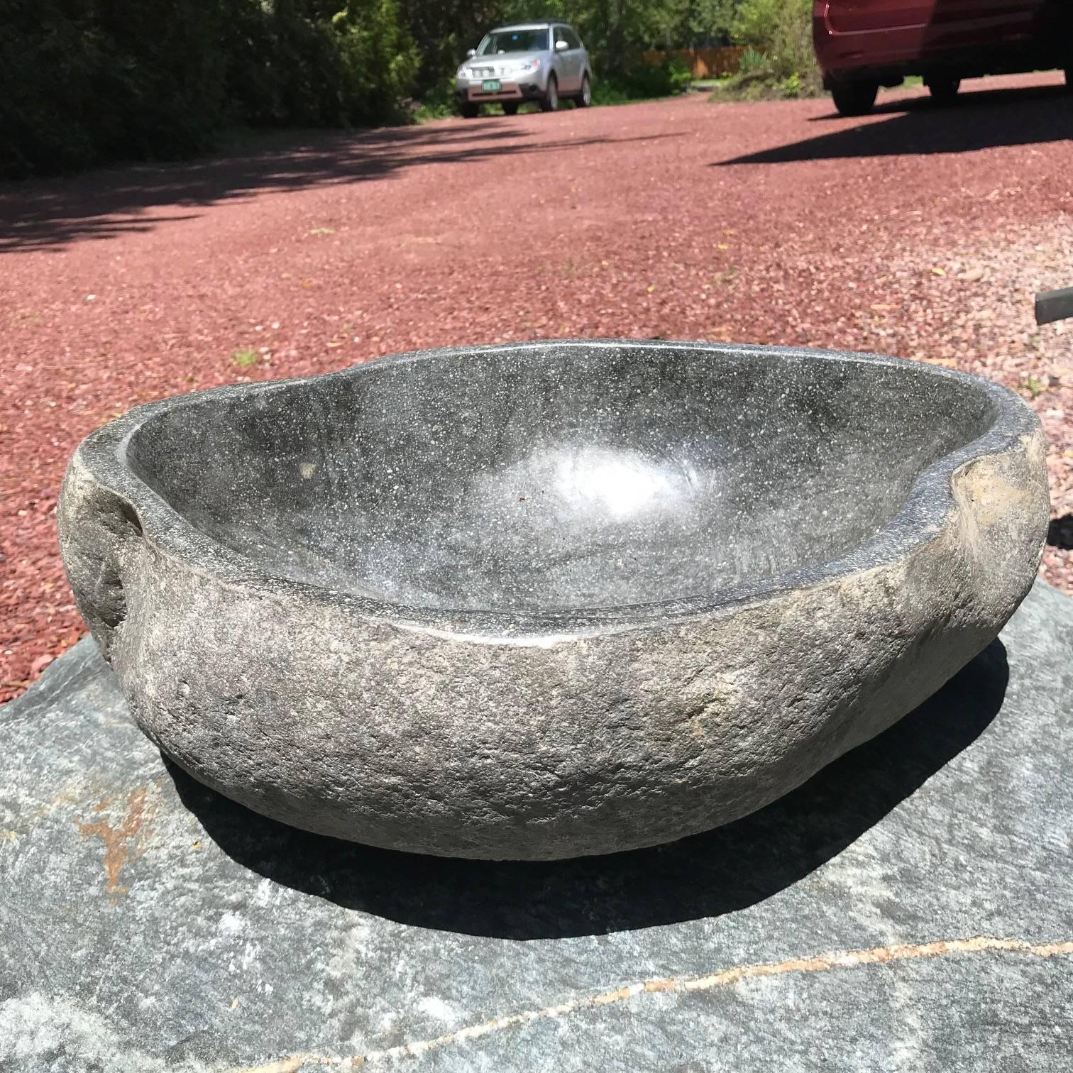 A one-of-a-kind visually attractive hand carved solid stone 
garden planter or water basin hand-carved from a natural river boulder.

In an organic natural form.

Beautiful simple design. Inside smooth to the touch.

Totally natural color