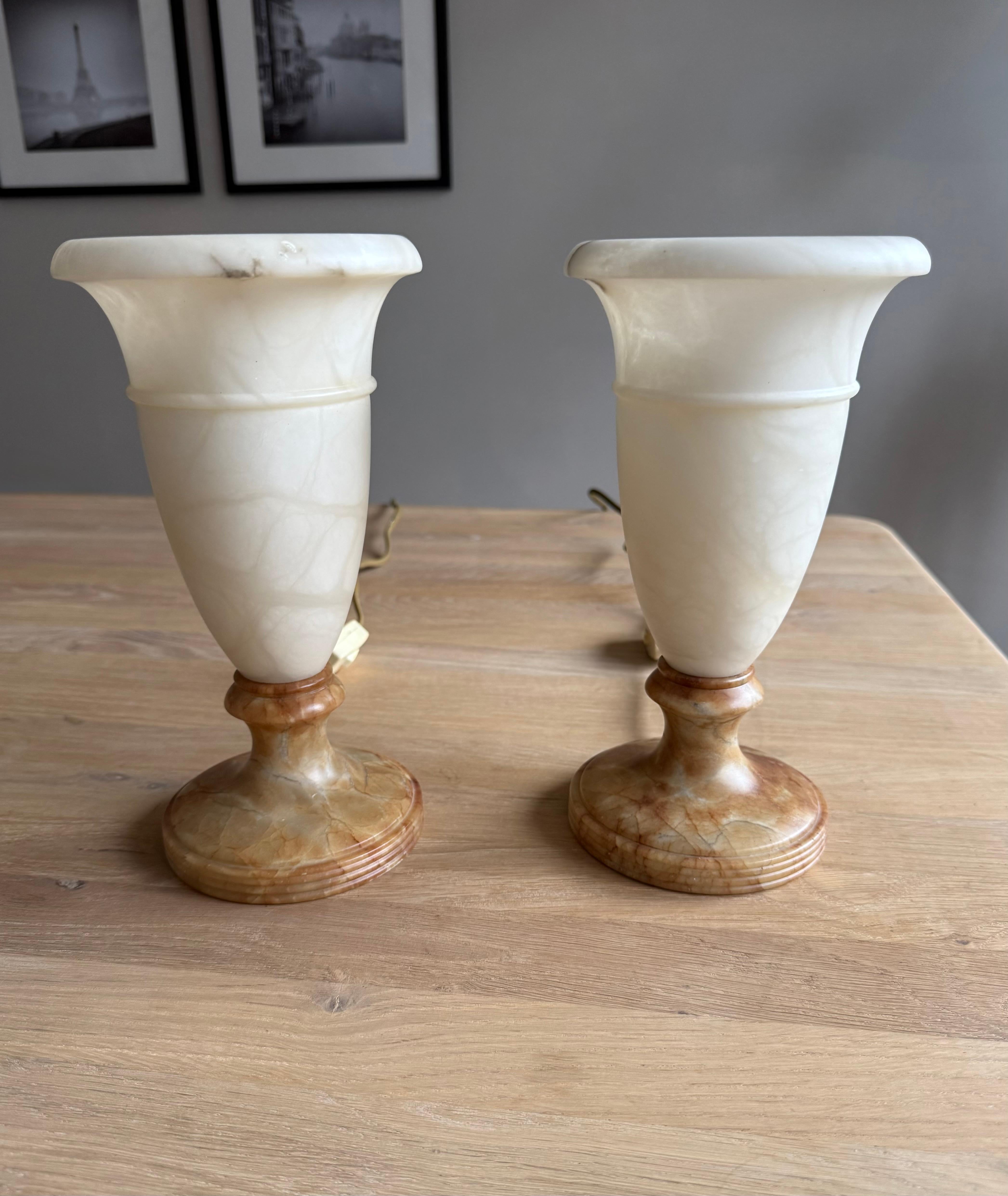 Perfect size and beautiful and full of natural character, atmosphere creating table lights.

This exquisite pair of handcrafted mineral stone table lamps is one of our most remarkable recent finds. Their ideal size, warm coloring, and timeless
