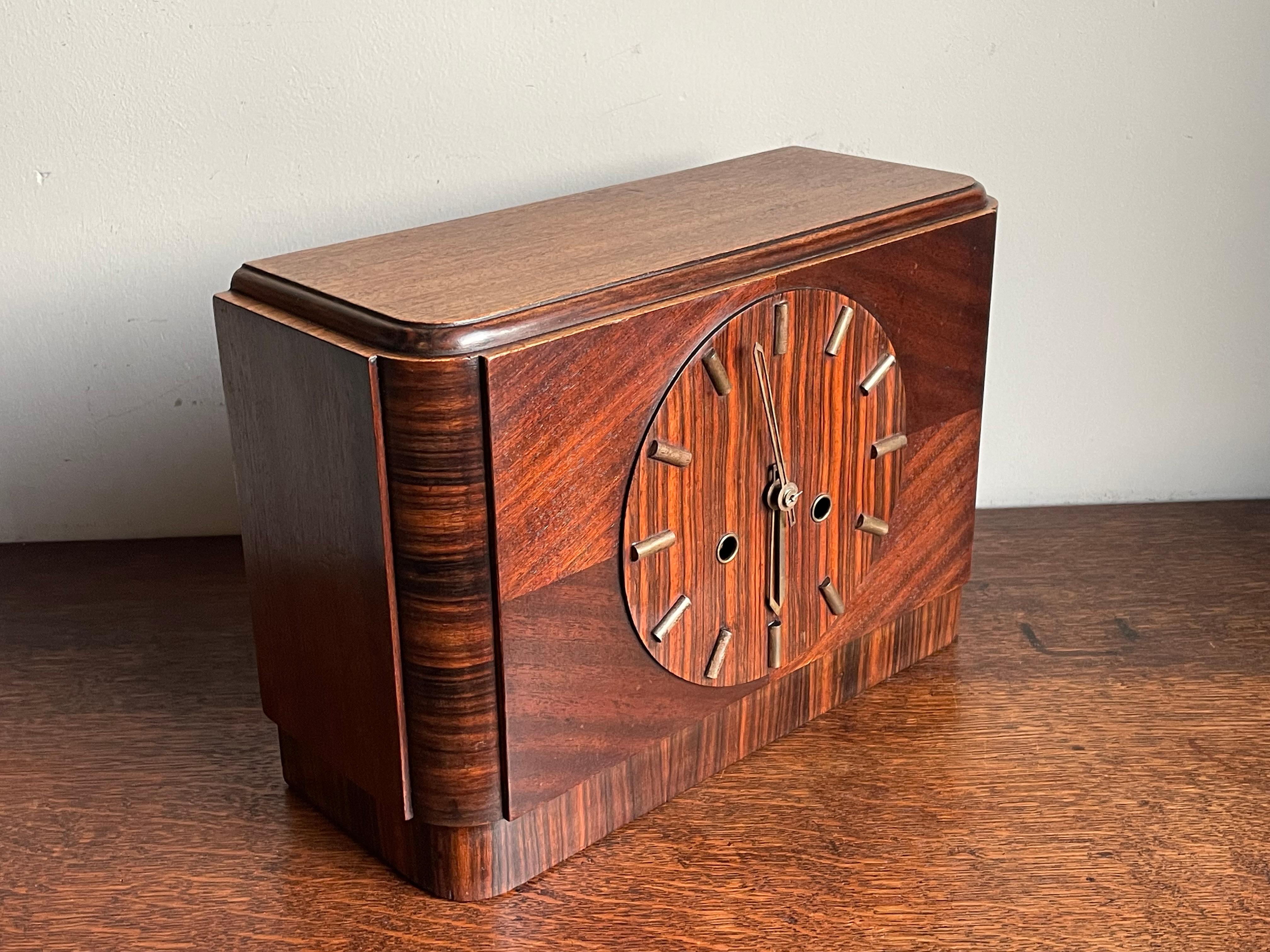 Beautiful and also practical in size, Bauhaus style clock.

Over the years we have sold a number of striking (no pun intended) Art Deco clocks, but rarely one as timeless, as stylish, as beautifully made and as perfectly symmetrical as this one. The