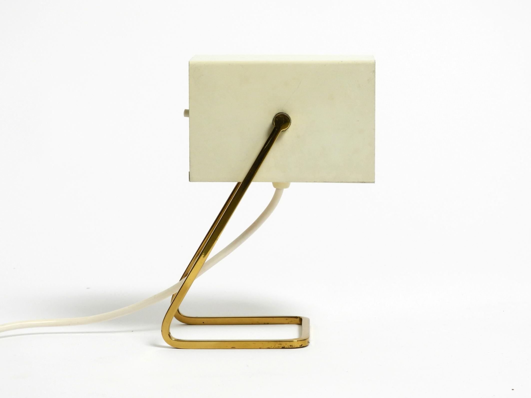 Space Age Great Mid Century Modern metal bedside lamp with brass base by Kaiser Leuchten For Sale