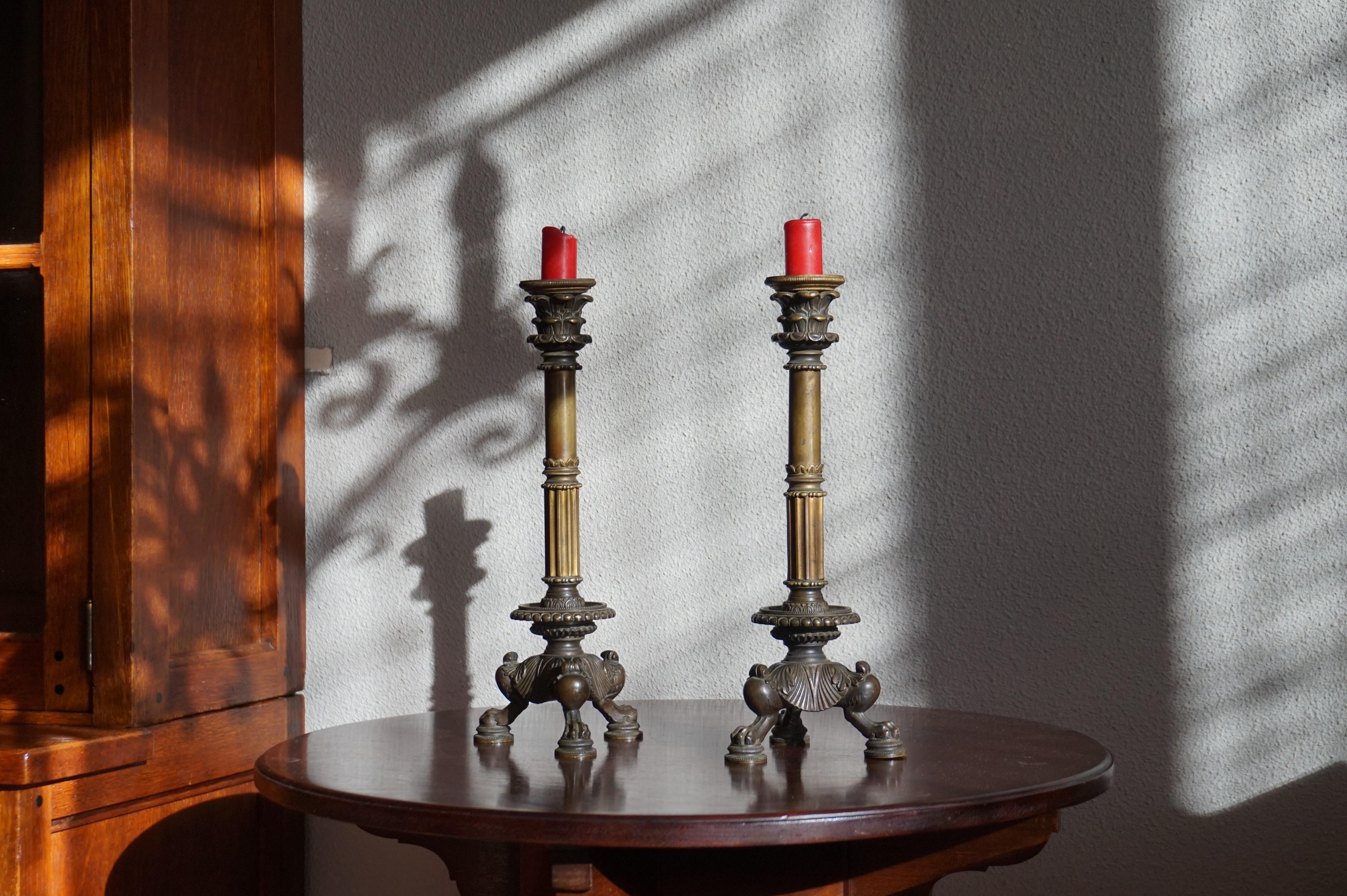 Practical size, antique bronze candleholders with original and removable bobeches.

If you are looking for excellent condition antiques to create the perfect atmosphere at home then this attractive and decorative pair of bronze candlesticks could be