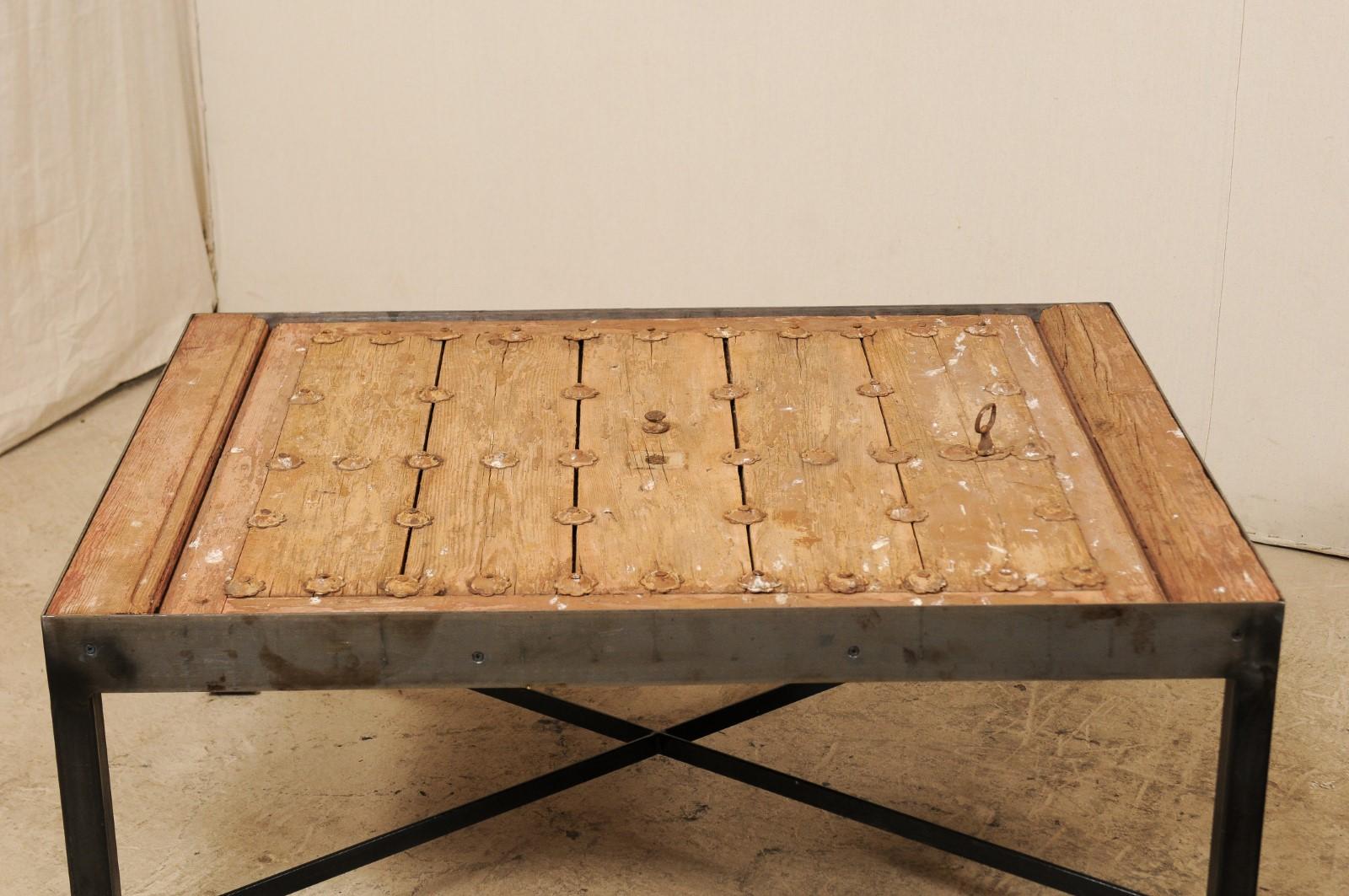 Pair of 18th C.  Spanish Door Coffee Tables on Custom Iron Bases In Good Condition For Sale In Atlanta, GA