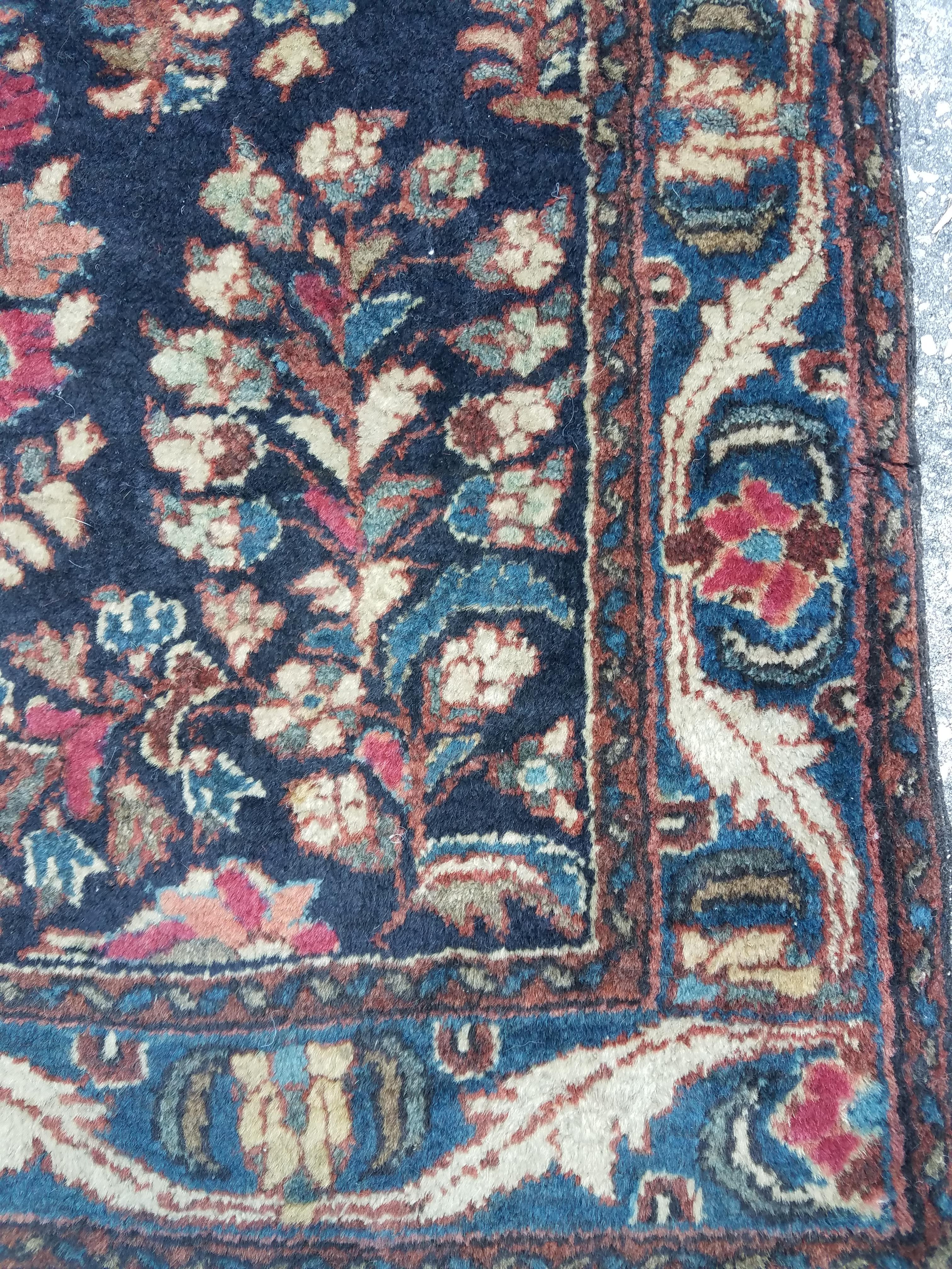 Stunning Turkish area rug measuring approximately 57