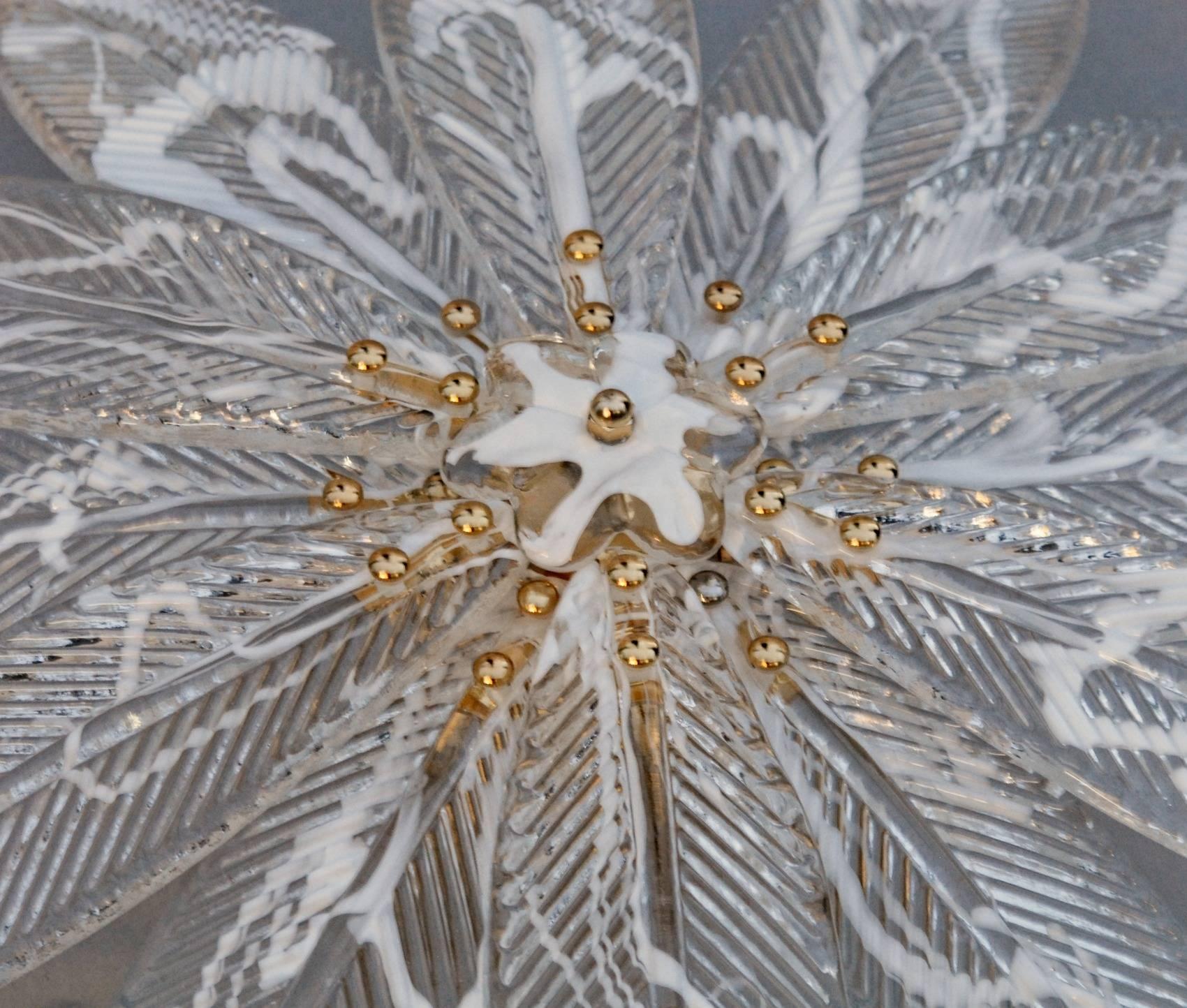 This shallow ceiling mount Murano chandelier was first designed for a luxury vessel ship low ceiling and now is used to pair with Mid-Century Modern Barovier palmette chandeliers, that are usually very tall. This beautiful 12 palm leaves flush mount