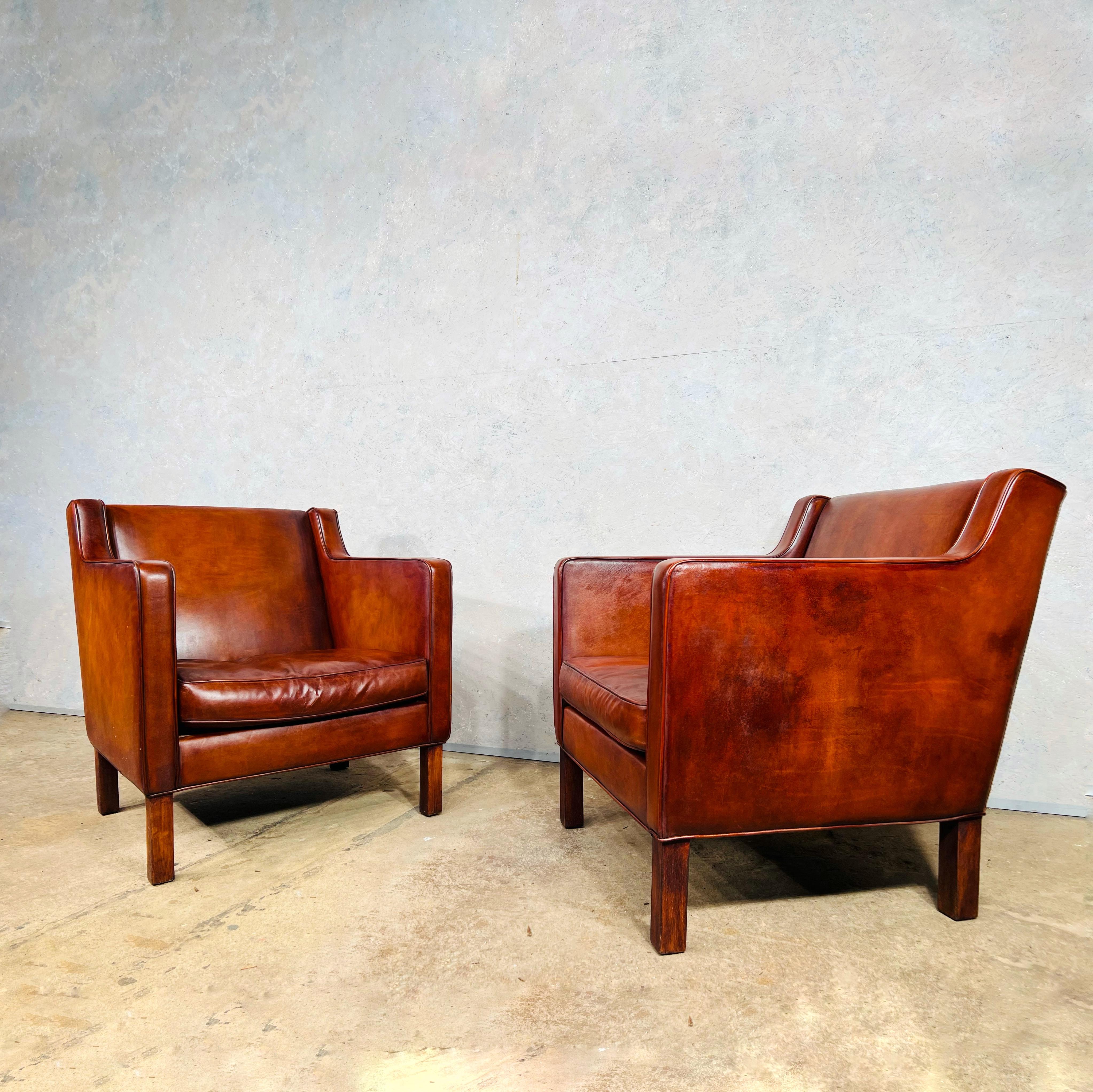 Great quality vintage Borj Mogensen style pair of leather armchairs.
Beautiful hand dyed leather, a most beautiful cognac colour with a great finish.

In great condition.

Viewings welcome at our showroom in Lewes, East Sussex.

Delivery to