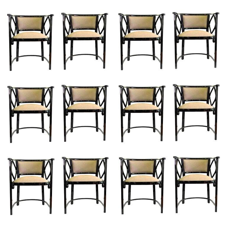 Set of 12 armchairs by Thonet, Austria 
The chairs were a part of a set made on order for a Villa in Götzens, Tirol, Austria
Designer: Josef Hoffmann
Materials : Steamed bent beechwood, high gloss french polish, brass screws, brass upholstery nails.