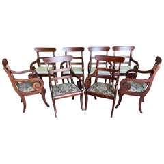 Gran conjunto de 8 sillones ingleses de caoba con patas de sable del siglo XIX