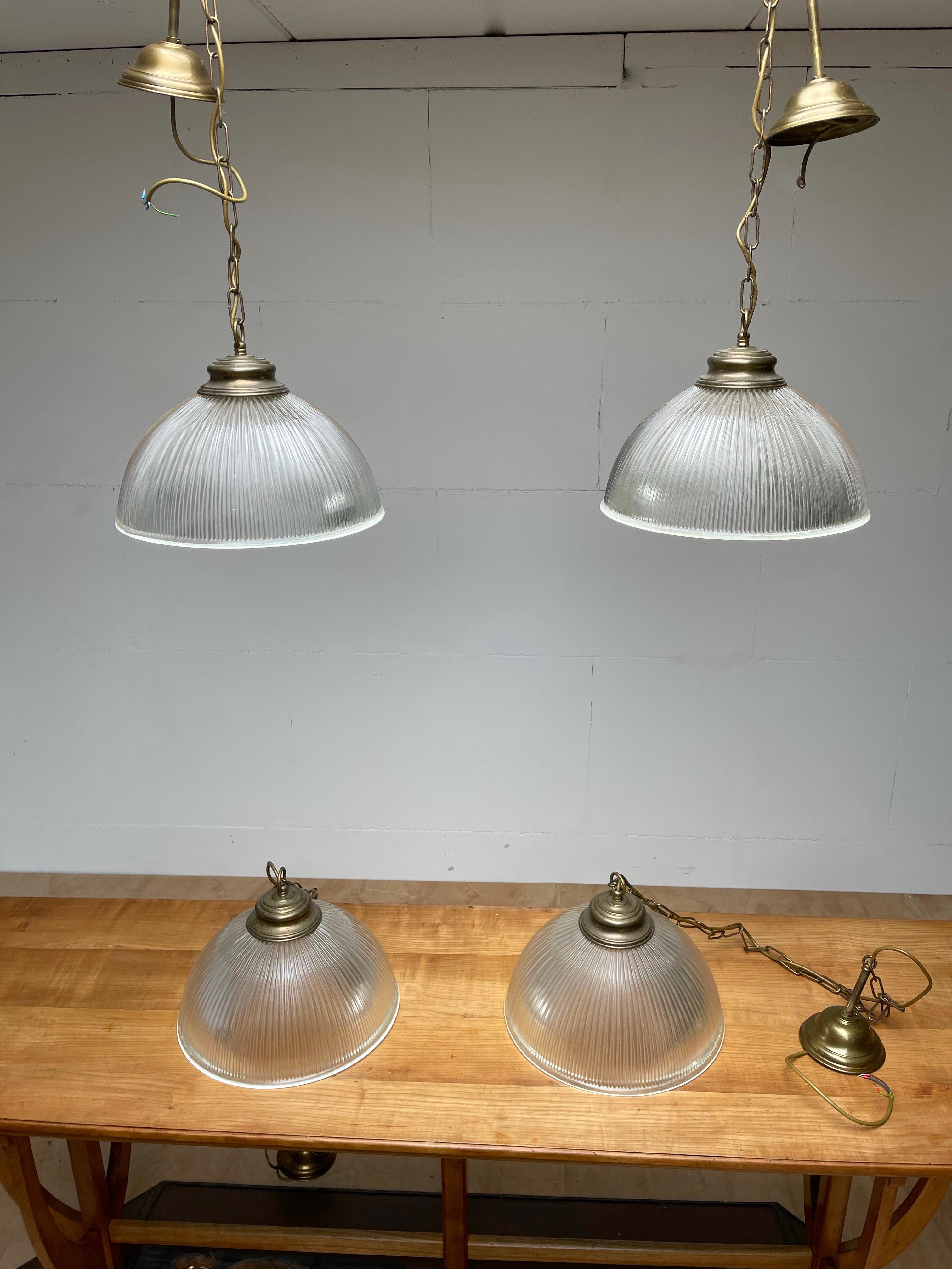 European Set of 4 Midcentury Modern Brass and Glass Holophane Style Pendant Lights