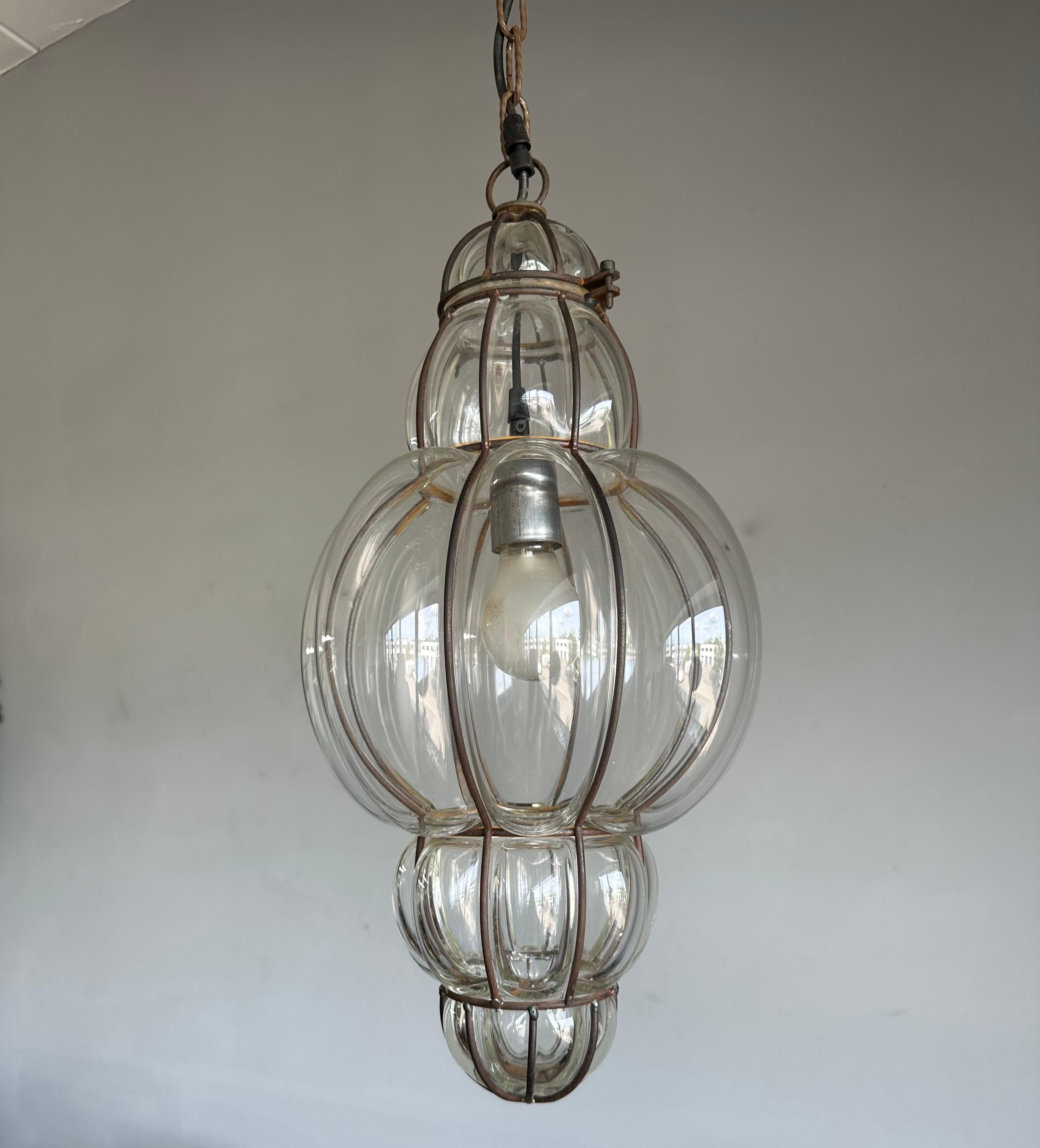 Good size, rare design, midcentury made and great condition hallway or porch light fixture.

This good size and very rare, elongated shape Venetian pendant is the only one of its kind that we ever had the pleasure of offering. The thick, transparent