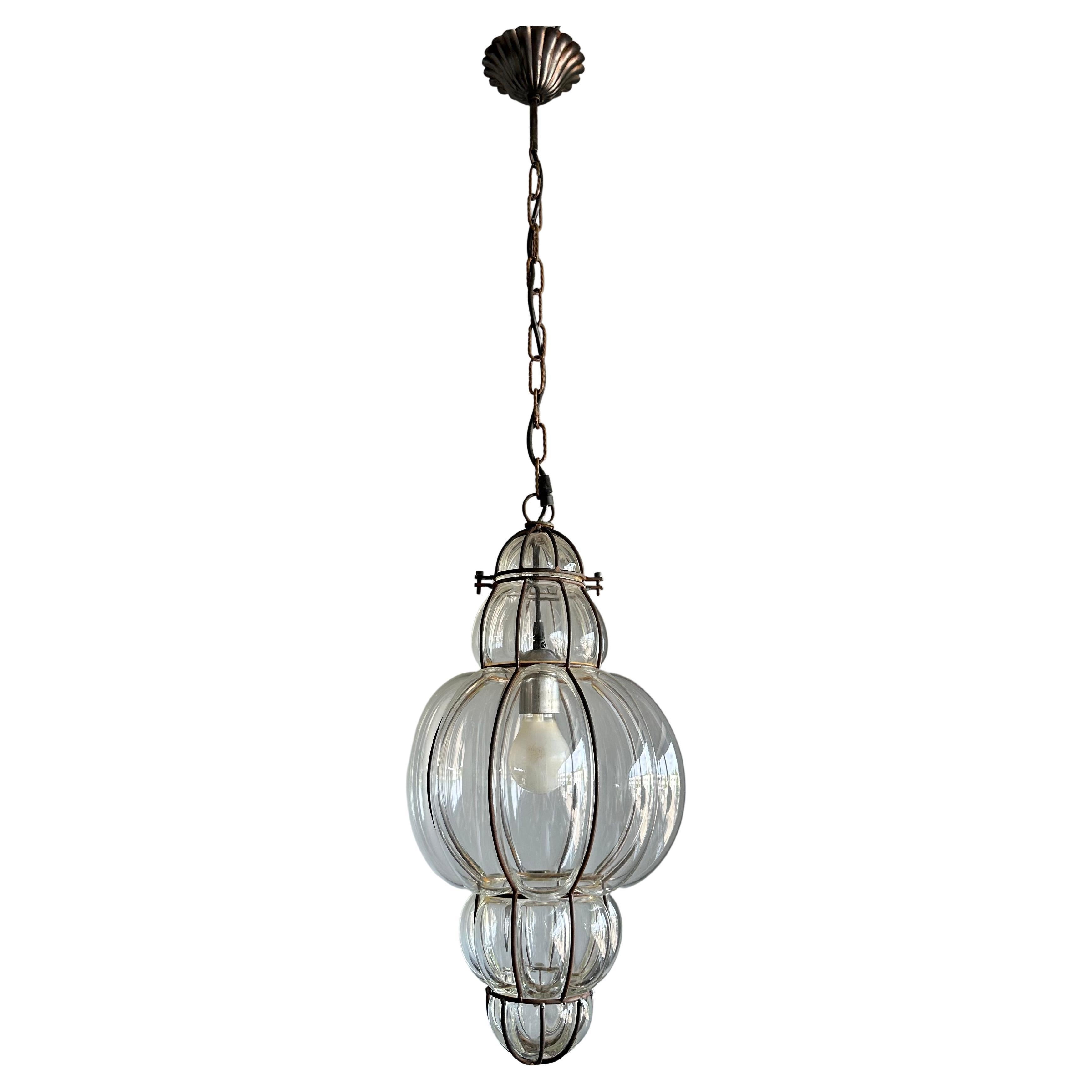 Great Shape Venetian Mouth Blown Glass in Hand Knotted Metal Frame Pendant Light For Sale