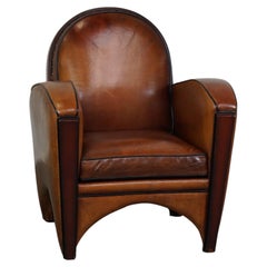 Great sheep leather Artdeco design armchair with a unique design
