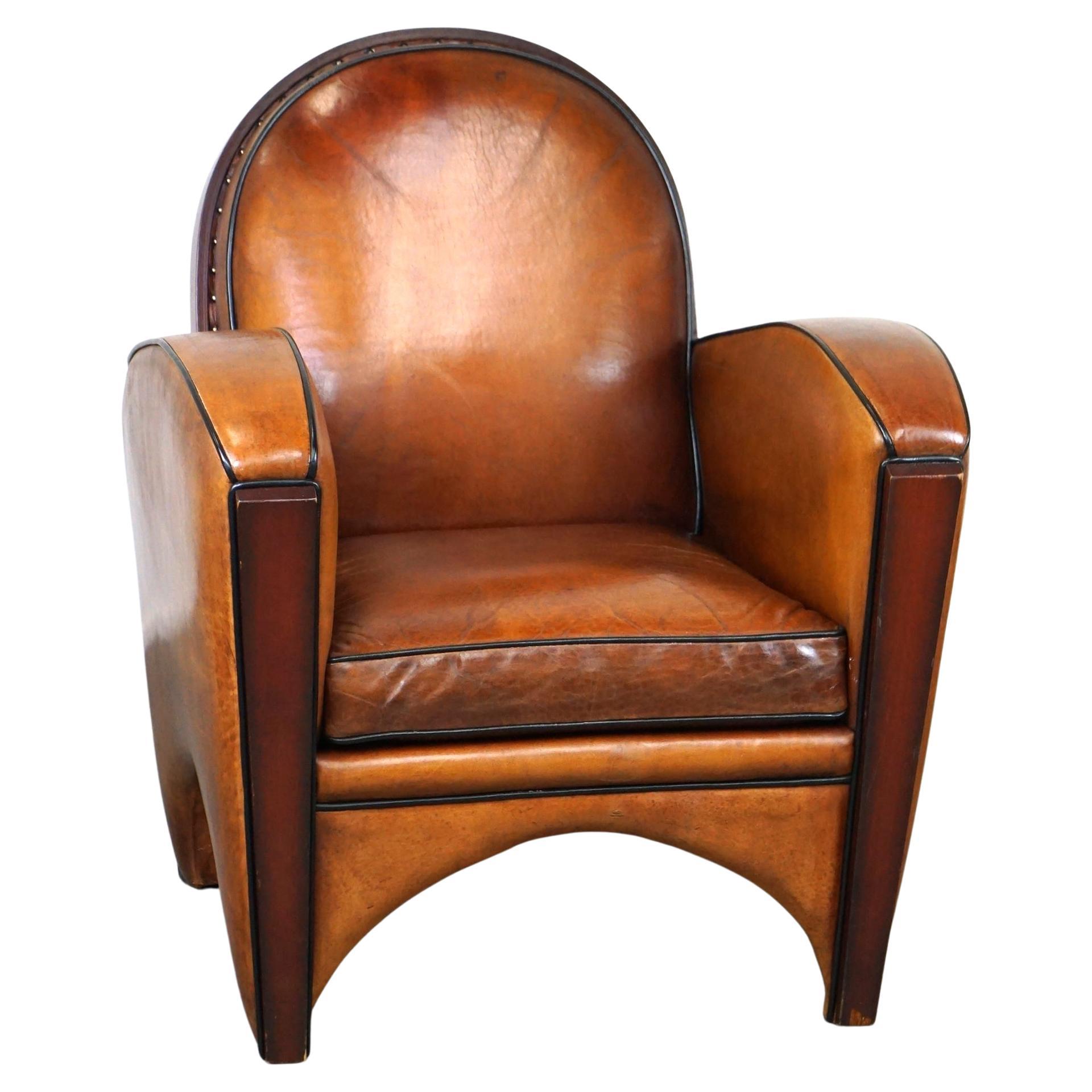 Great sheep leather Artdeco design armchair with a unique design