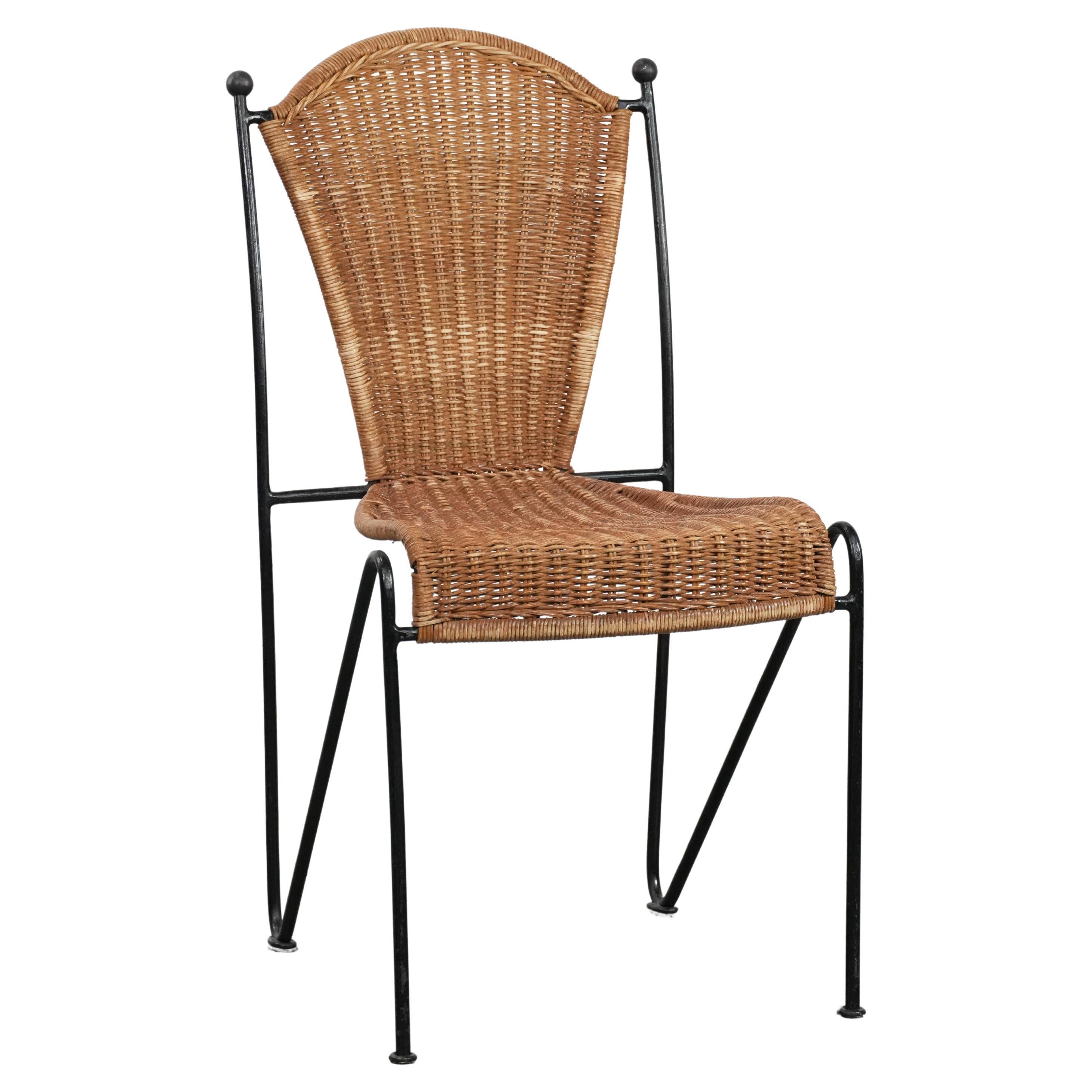 Great vintage design chair by Frederick Weinberg with a cast iron frame For Sale