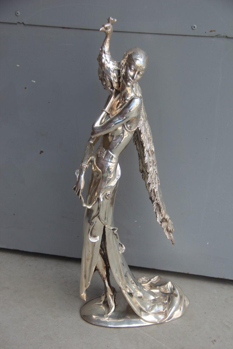 Great woman with Art Deco peacock in resin and silver Italian design, 1970.