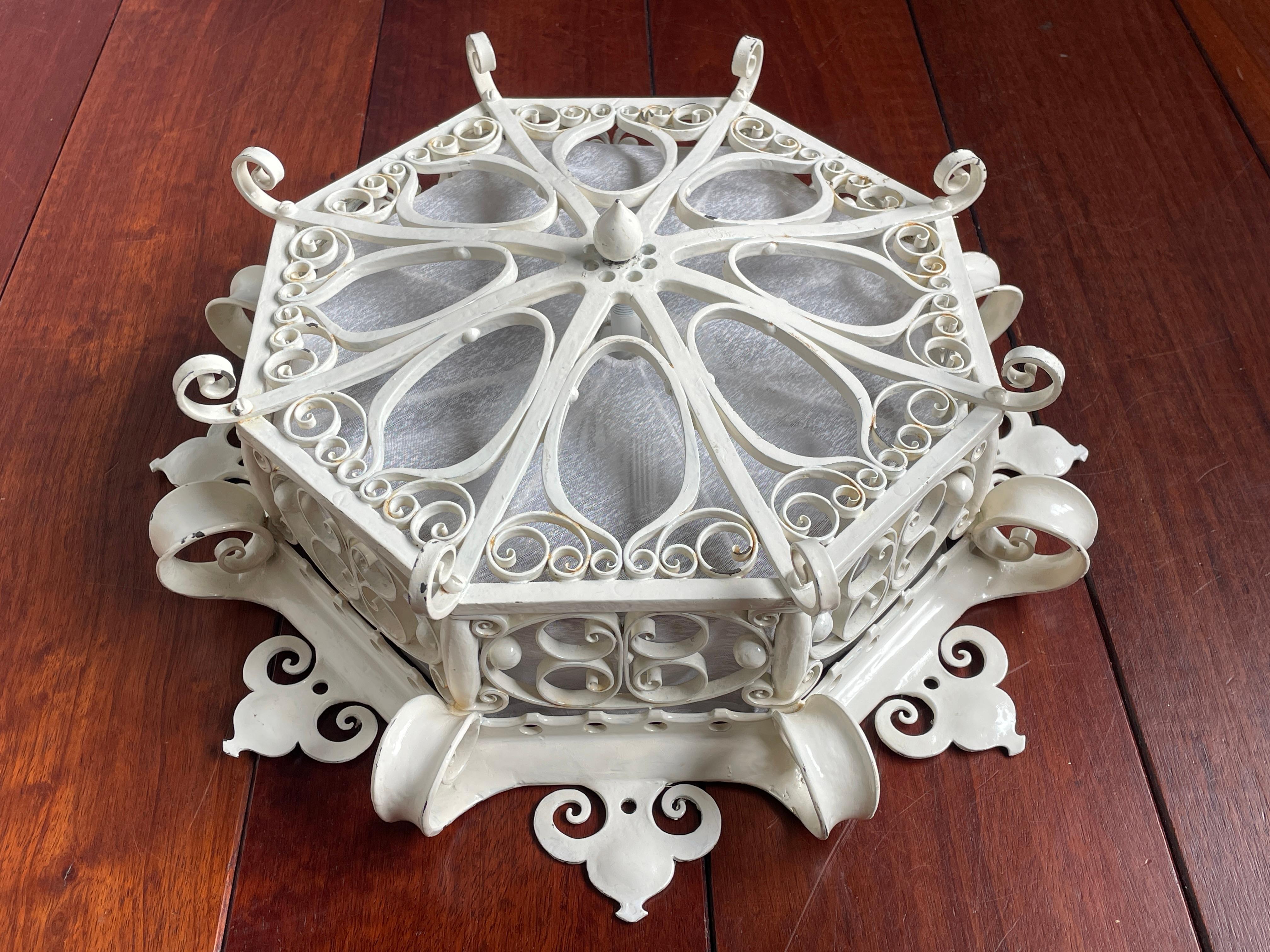 Rare, decorative, good size and great workmanship wrought iron flushmount.

Some antiques you only find once in your life and this definitely seems the case with this hand-forged, early to mid 1900s flush mount. We have never before owned or seen a