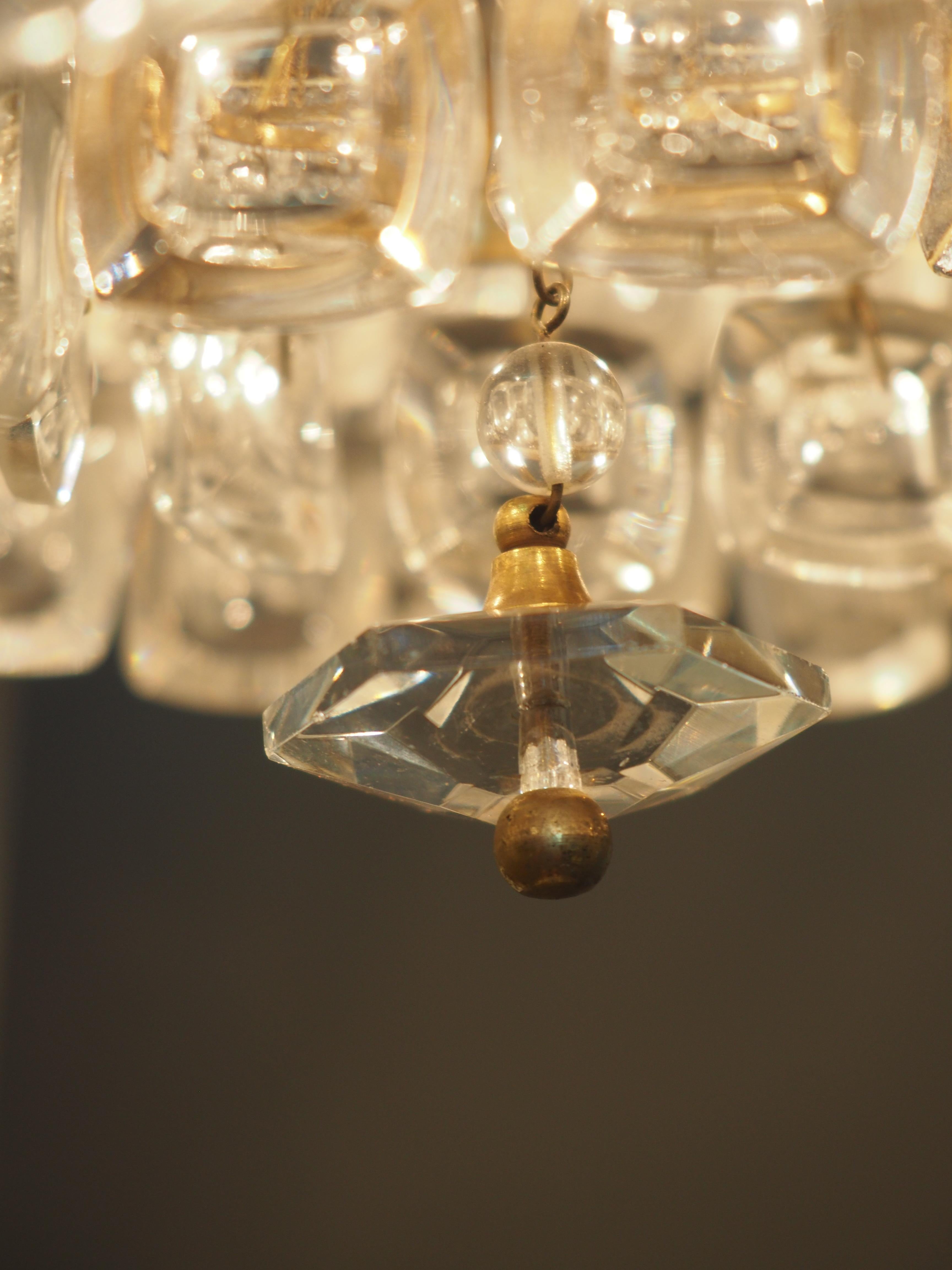 Great Six-Tiered Gilt Brass and Lens Glass Chandelier by Palwa, circa 1970s In Excellent Condition For Sale In Wiesbaden, Hessen