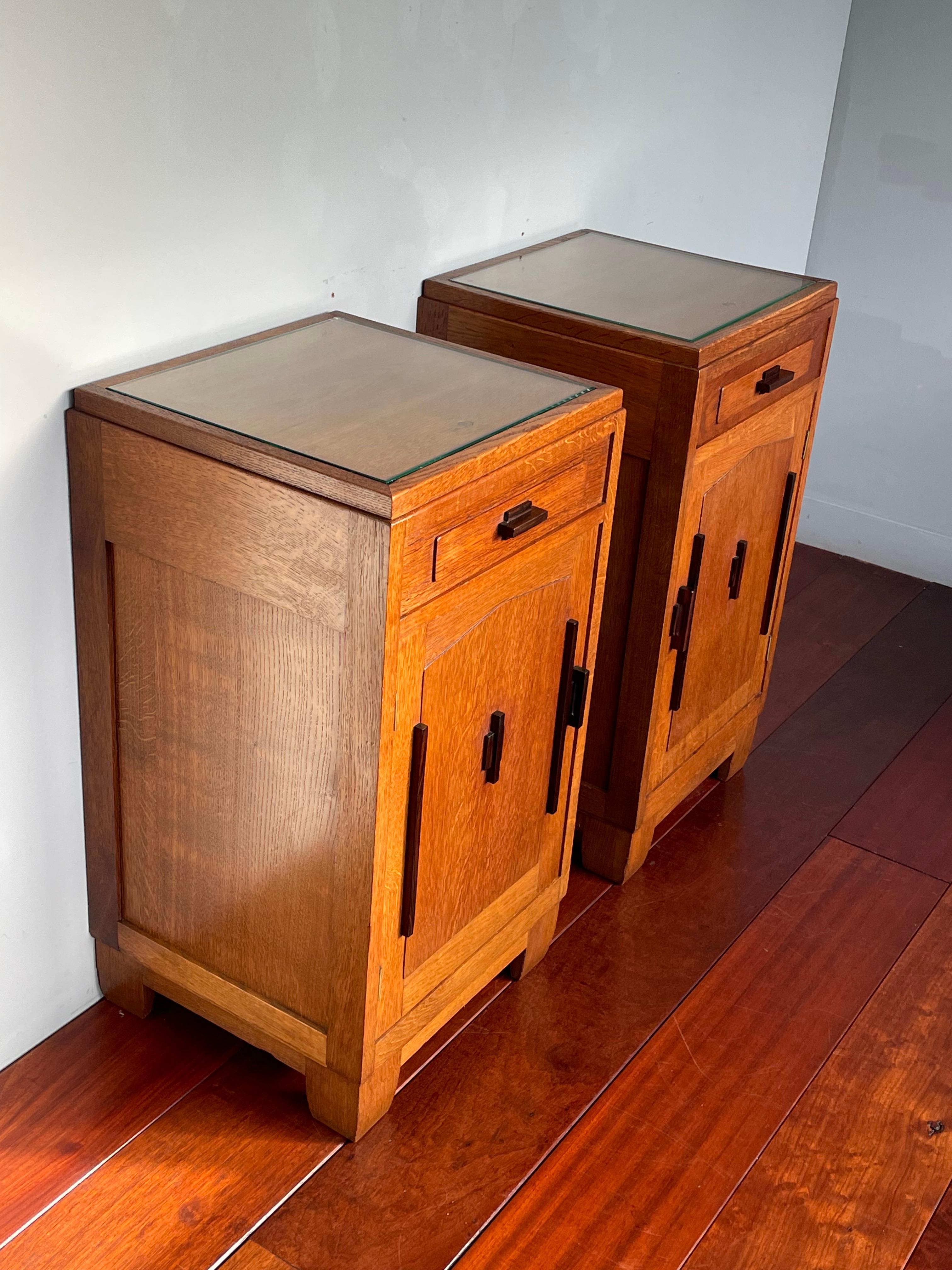 Best ever pair of Dutch Arts & Crafts nightstands with original glass tops.

If you are looking for truly timeless and beautifully handcrafted bedside cabinets then this Arts & Crafts pair could be yours to own and enjoy soon. They are made of a