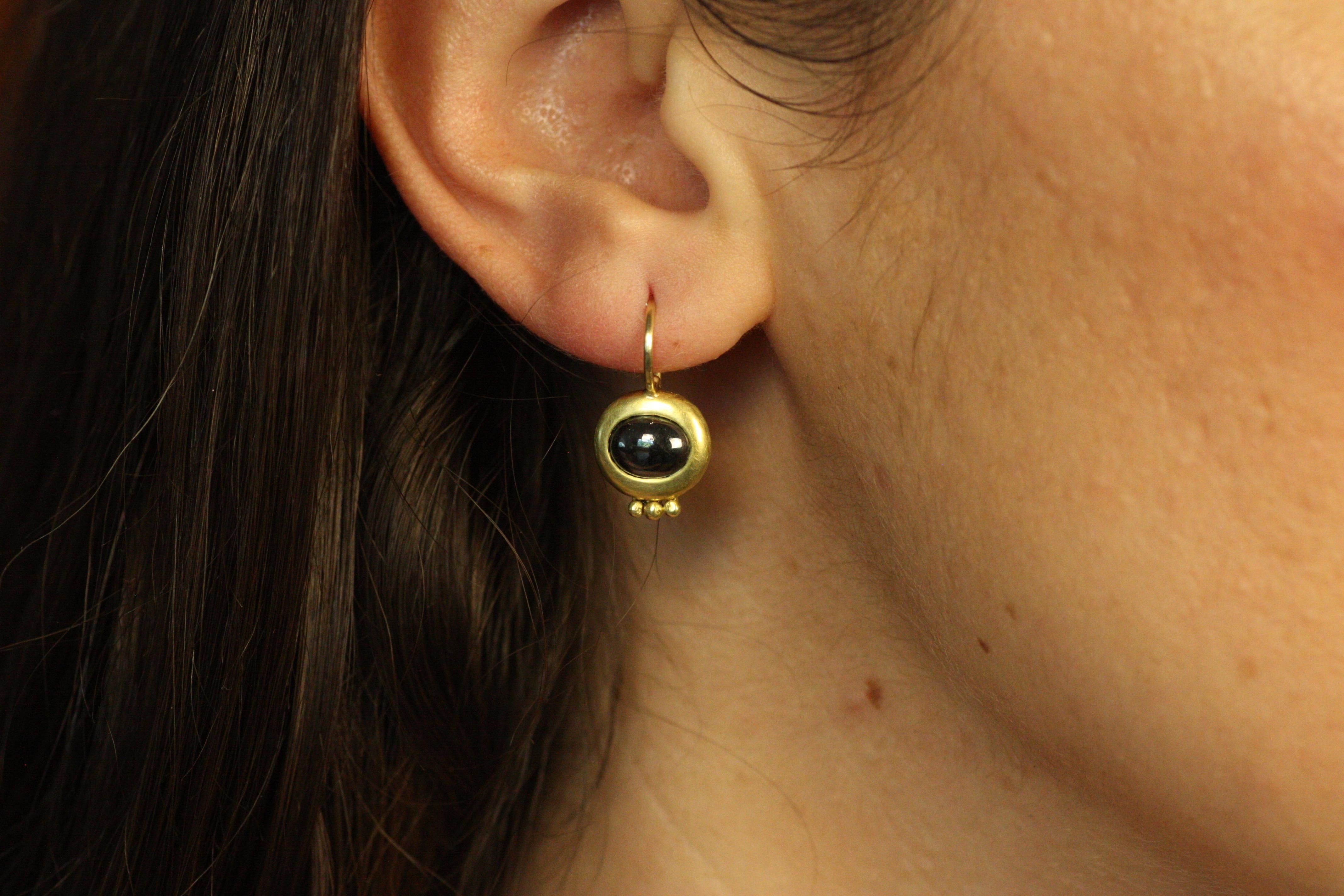 These Greco Earrings in 20K California gold with California hematite stones are a striking and bold choice. The bezel-set hematite—sourced from Bracken’s multi-generation family property in Nevada County—has a smooth, metallic finish that contrasts