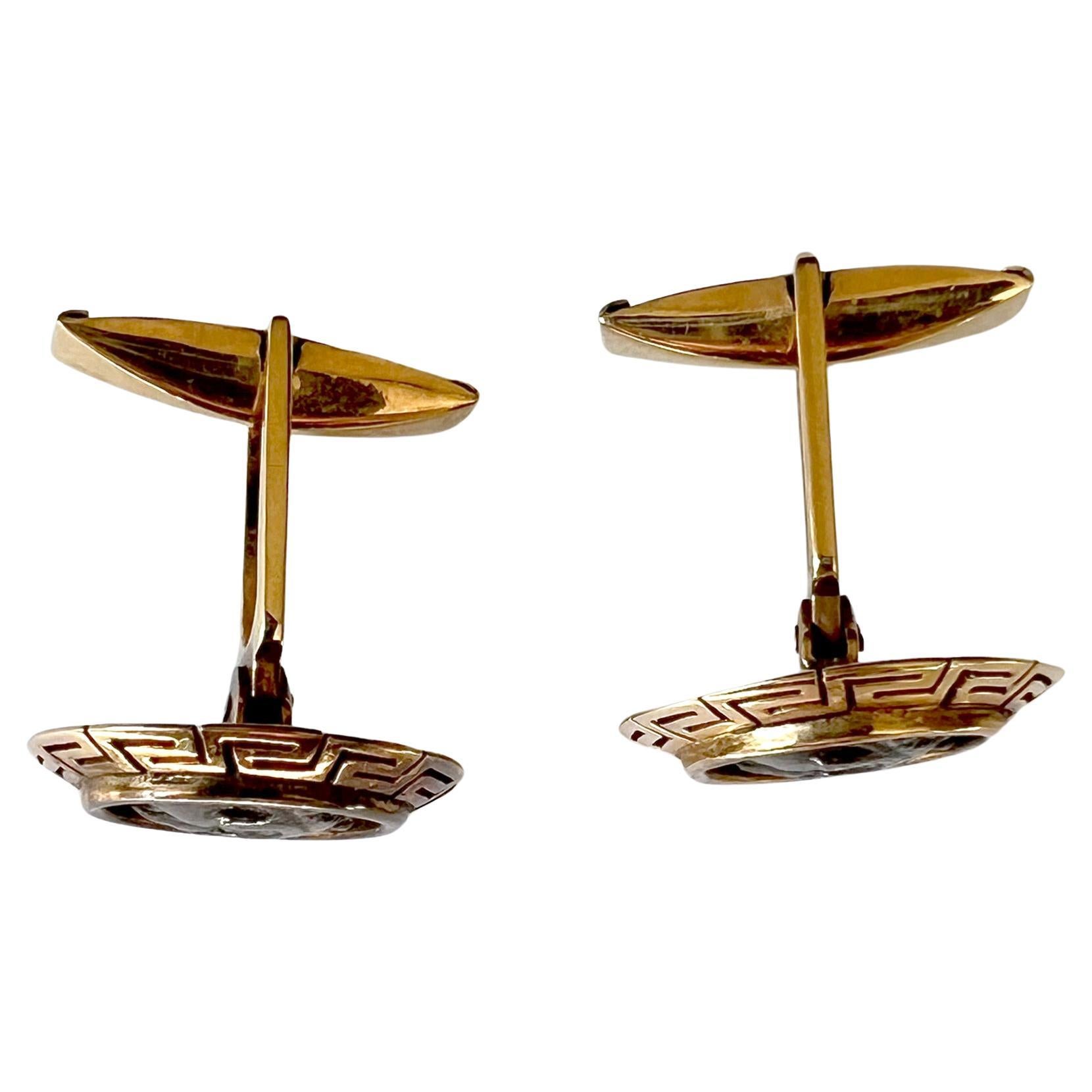 Greco Roman 18K gold and ancient silver Alexander the Great Dracma cufflinks, maker unknown. Cufflinks feature a pierced Greek key design at their edge, surrounding silver Dracmas.  They measure .75