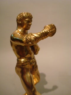 Reggilibri in bronzo dorato con combattenti greci, Francia, 1920