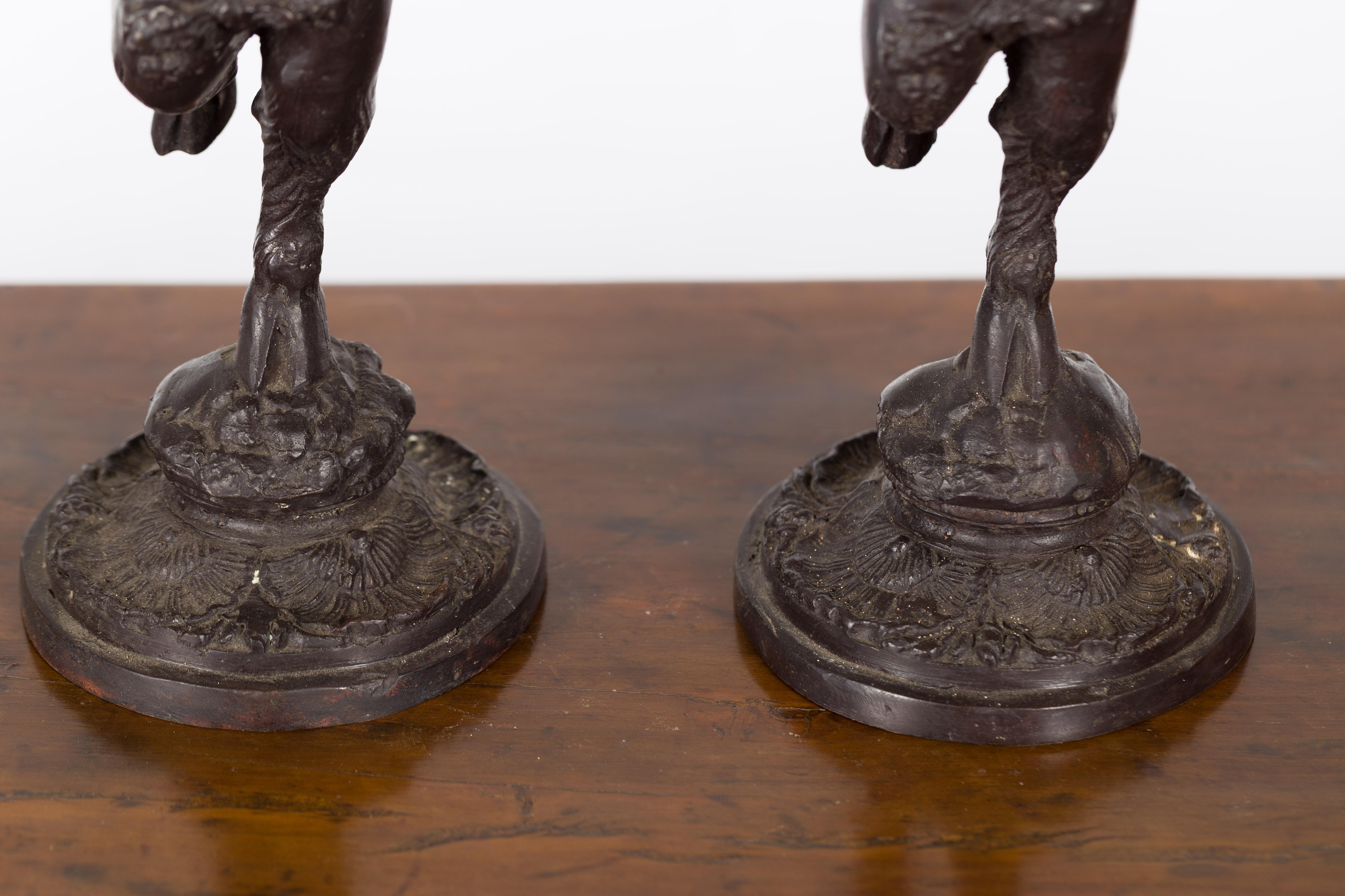 Greco-Roman Style Bronze Candle Holders Depicting Young Satyrs Holding Vessels For Sale 9