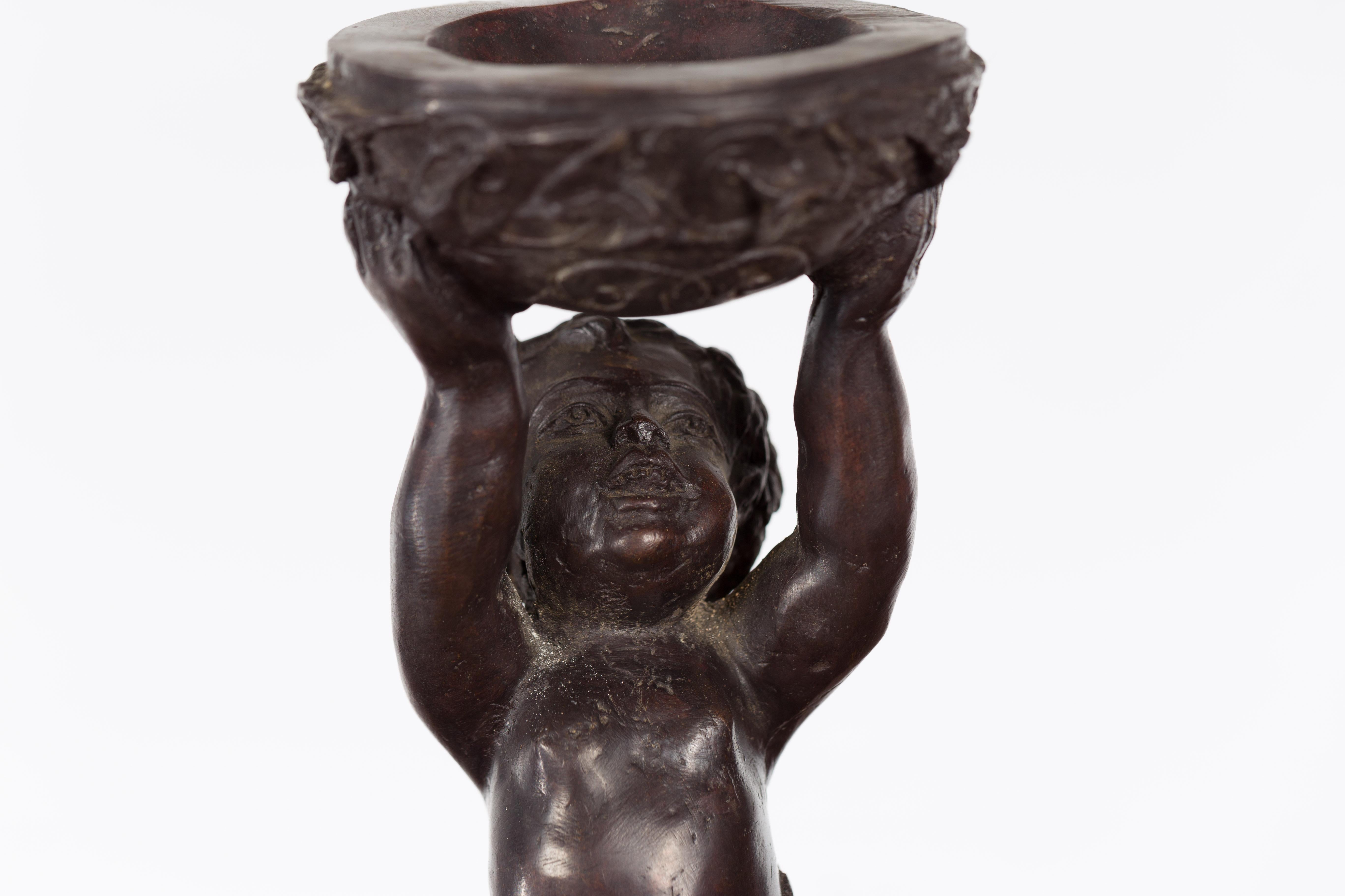 Greco-Roman Style Bronze Candle Holders Depicting Young Satyrs Holding Vessels For Sale 1
