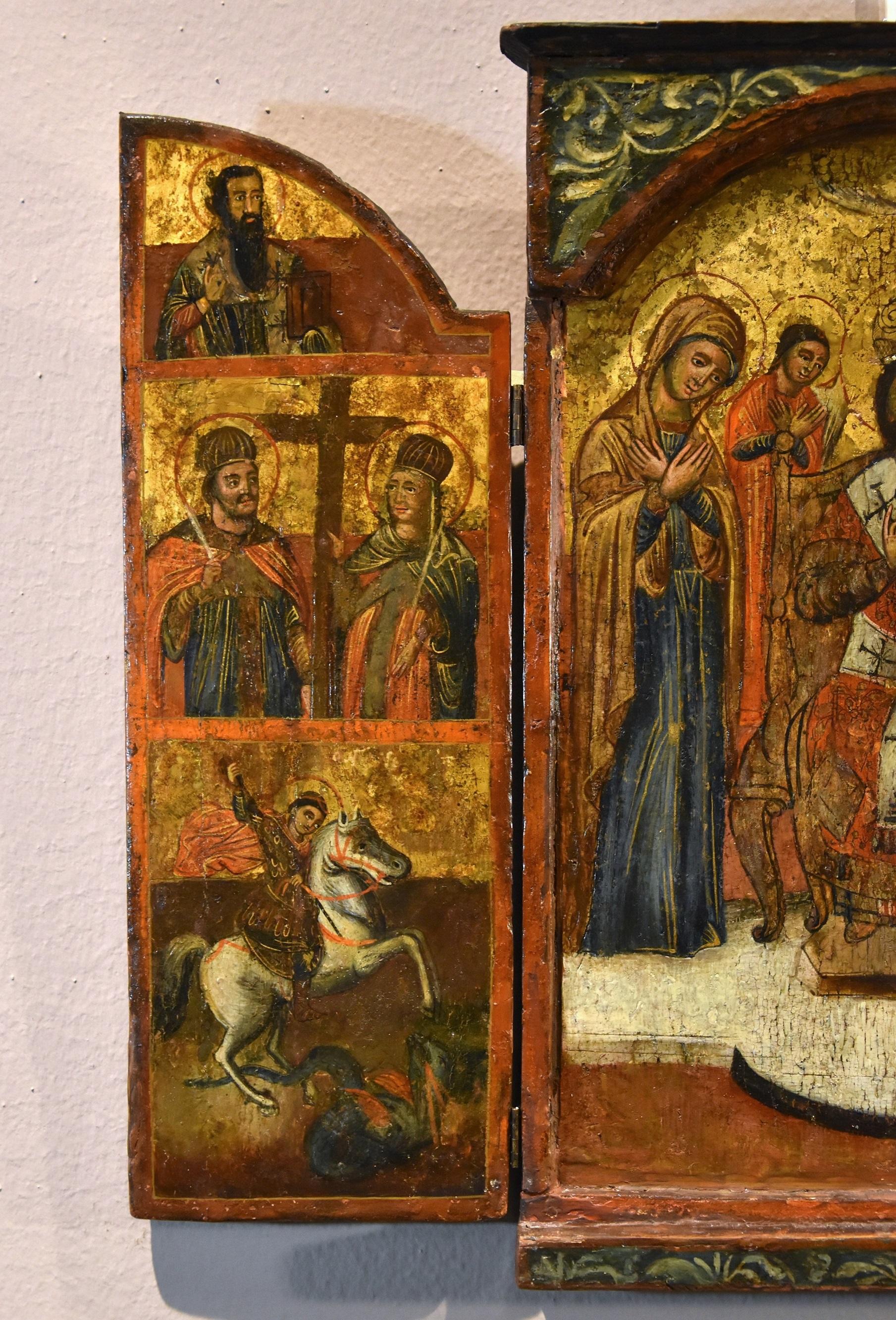 GREEK TRIPTYCH ICON DEPICTING THE DEESIS AND SAINTS
Greece, 17th century

Tempera on panel with gold ground

Icon Closed: 42 x 28 cm
Icon Open 42 x 53 cm

A pleasant and rather rare triptych icon is examined here, with a tabernacle-like structure