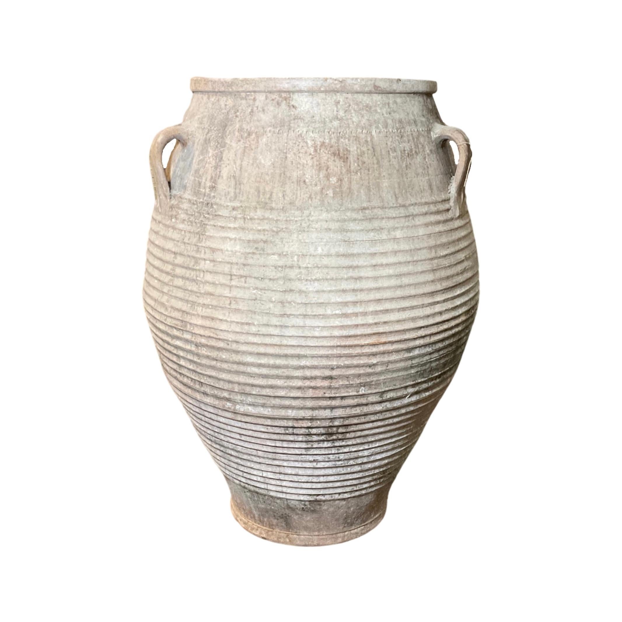 Add a classic touch to your outdoor space with this Greece Terracotta Planter. Crafted from high-fired clay, it is frost-proof, durable, and designed to last a lifetime. Its 18th century design adds timeless charm to any garden.