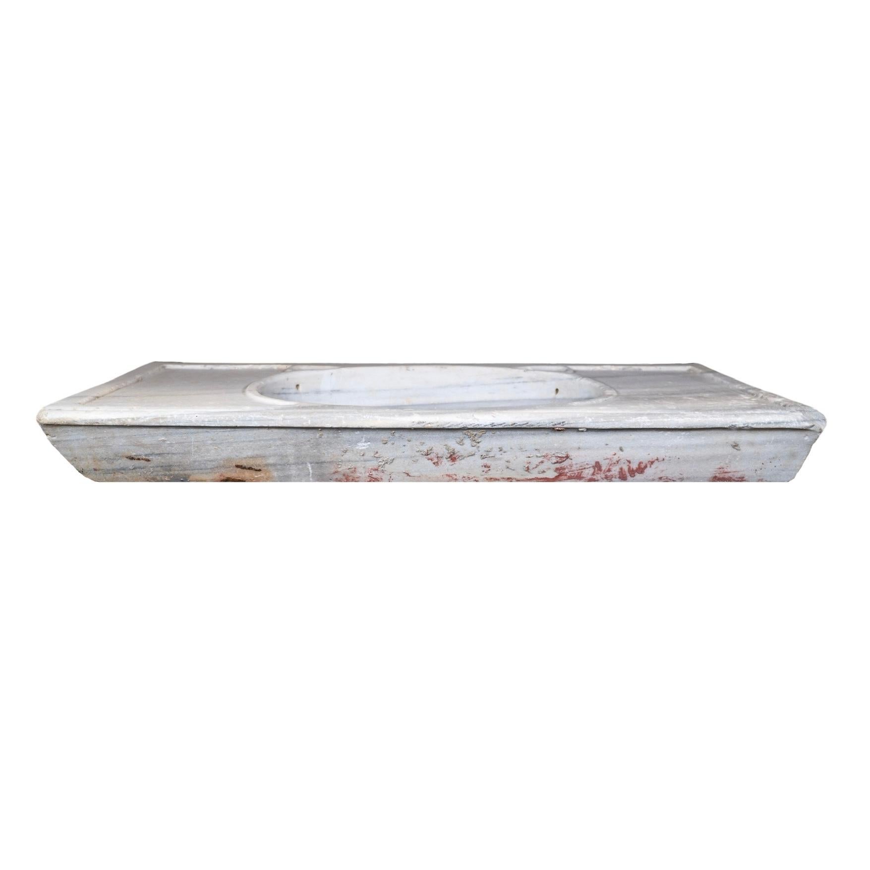 Crafted from luxurious white veined Carrara marble imported from Greece and designed in a low-line rectangular wide shape, this Greece Marble Sink adds a touch of elegance to any bathroom. Its has a pre-drilled hole for easy drainage. Its timeless