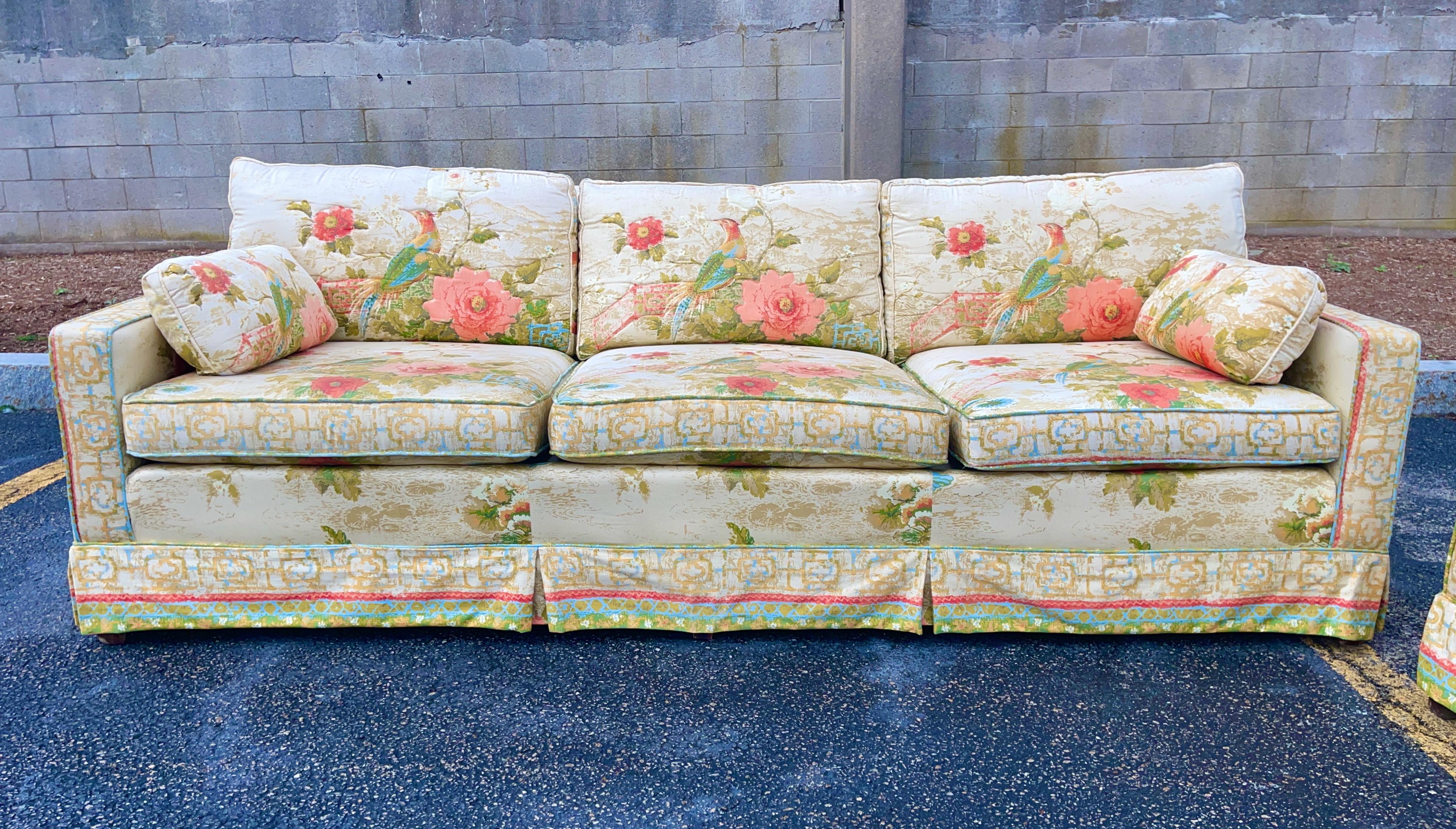 Sofa covered in Peony Garden by Greef-Warner from their Jasmine and Jade collection.
Quilted on one side of seat, back and throw cushions.
Pheasants, bamboo trellis, floral design. 
This was produced by Pem-Kay Furniture Co of Conover, NC founded by