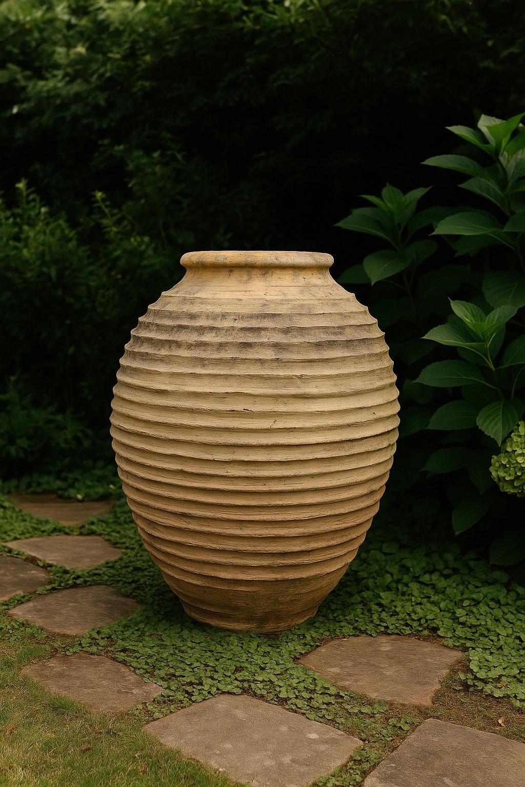 Large Peloponnese Greek Olive Oil Pot in Beehive Ribbed Design

19th century Large Greek Olive Oil Pot - This 19th-century Greek olive oil pot is a stunning piece of antique Mediterranean craftsmanship, originating from the Peloponnese region of