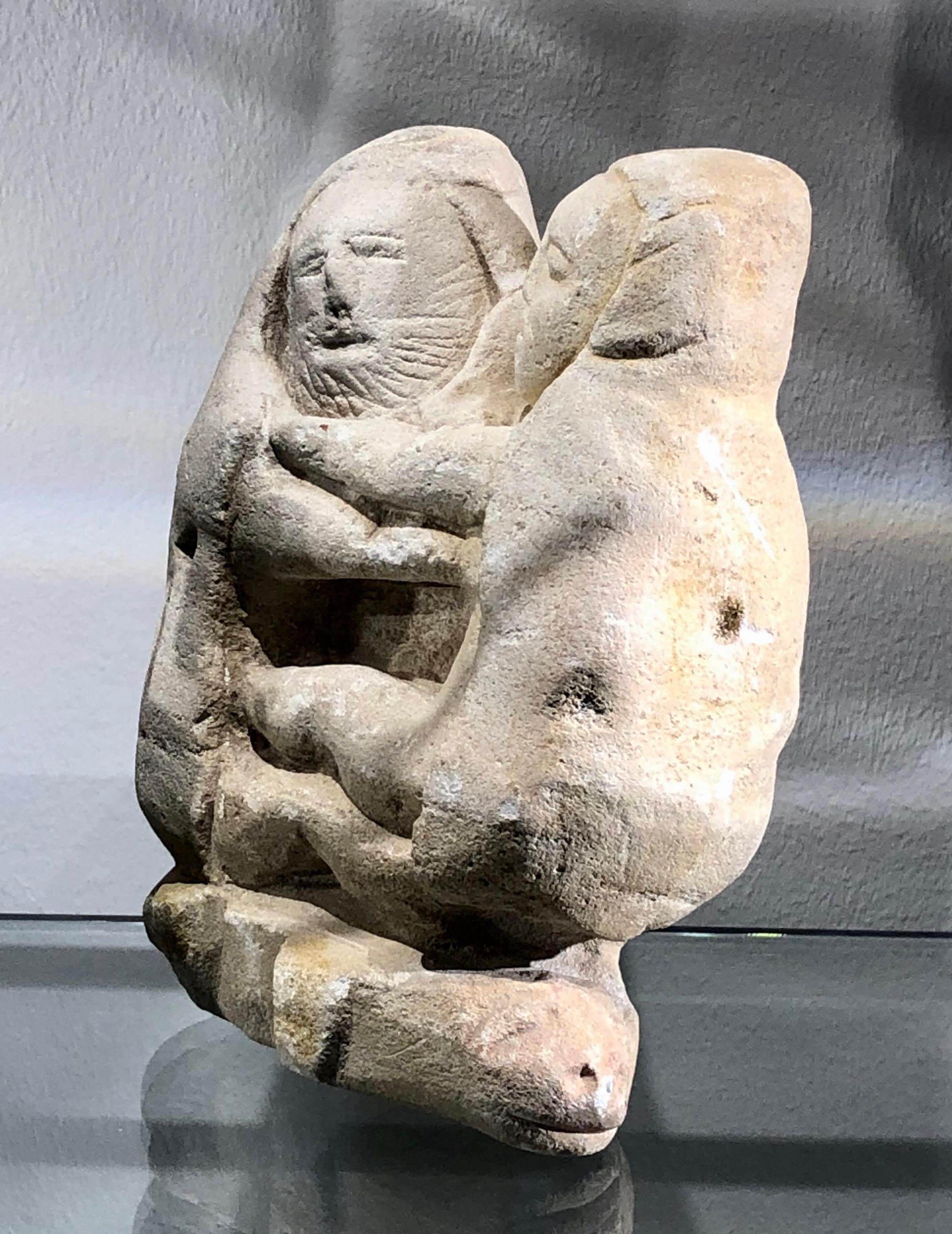 Classical Greek Greek archaic limestone sculpture representing 