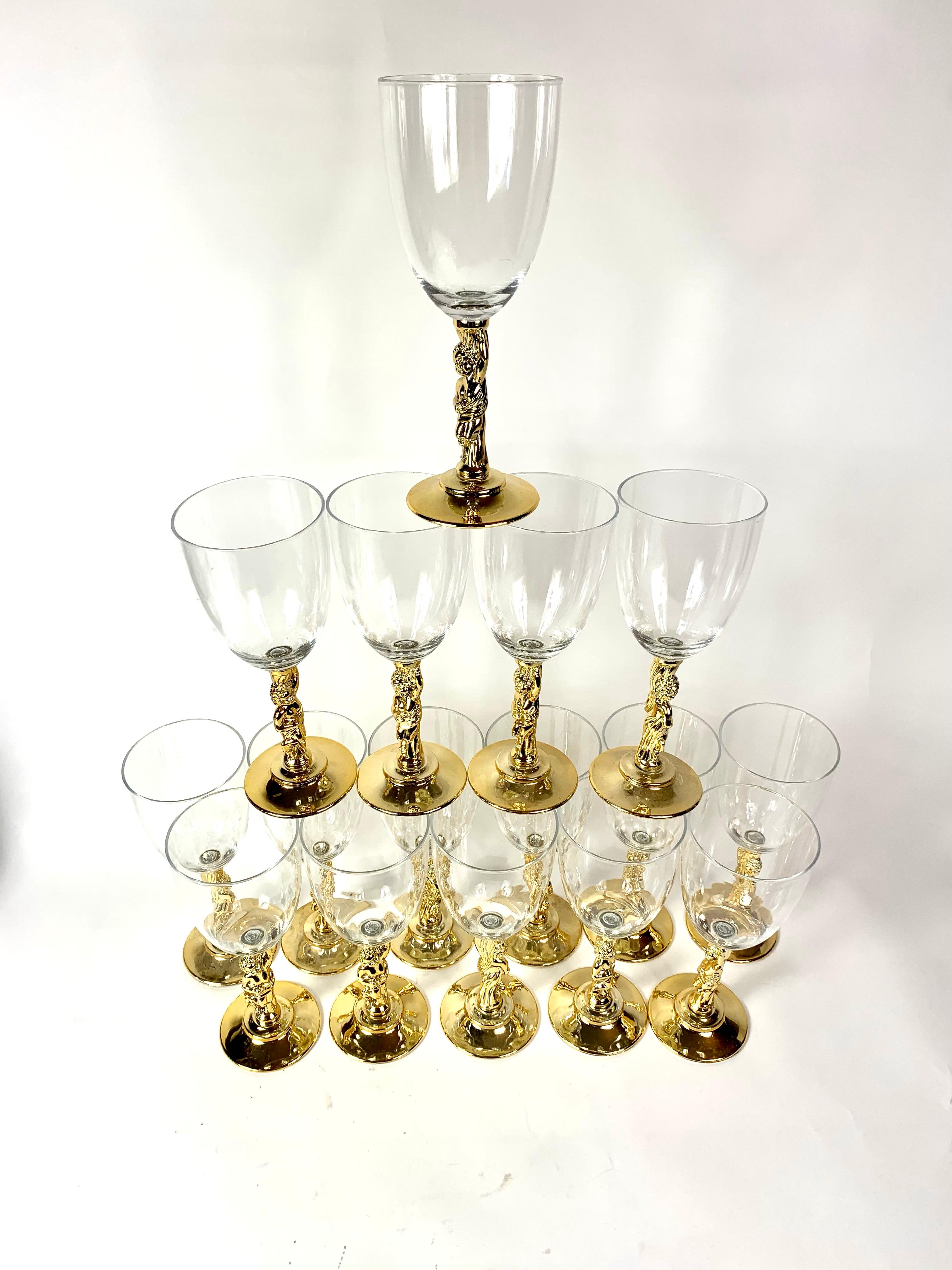 15 Stunning plastic glasses featuring a large bowl on a figural stem of a man in a toga most likely Bacchus. These plastic glasses are perfect for entertaining without worries about breaking glass. They are dishwasher safe on the top shelf so they