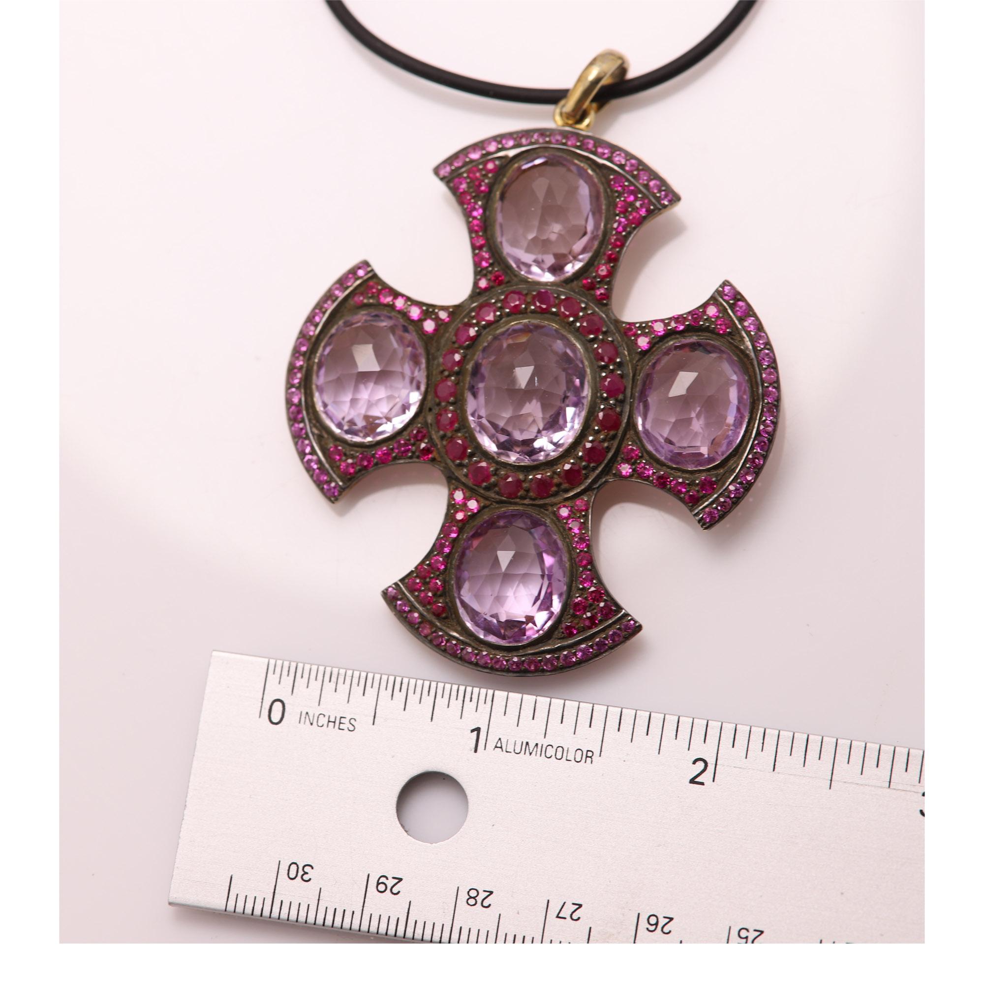 Unique Vintage Sterling Silver 925 & 18k Gold in black rhodium Cross
Hand made in India.
Approx 2' x 2' Inch 
Sterling Silver 925 plated black rhodium 
Natural Oval shape light amethyst
Natural Ruby Gemstones all around
Back area and bail is plated