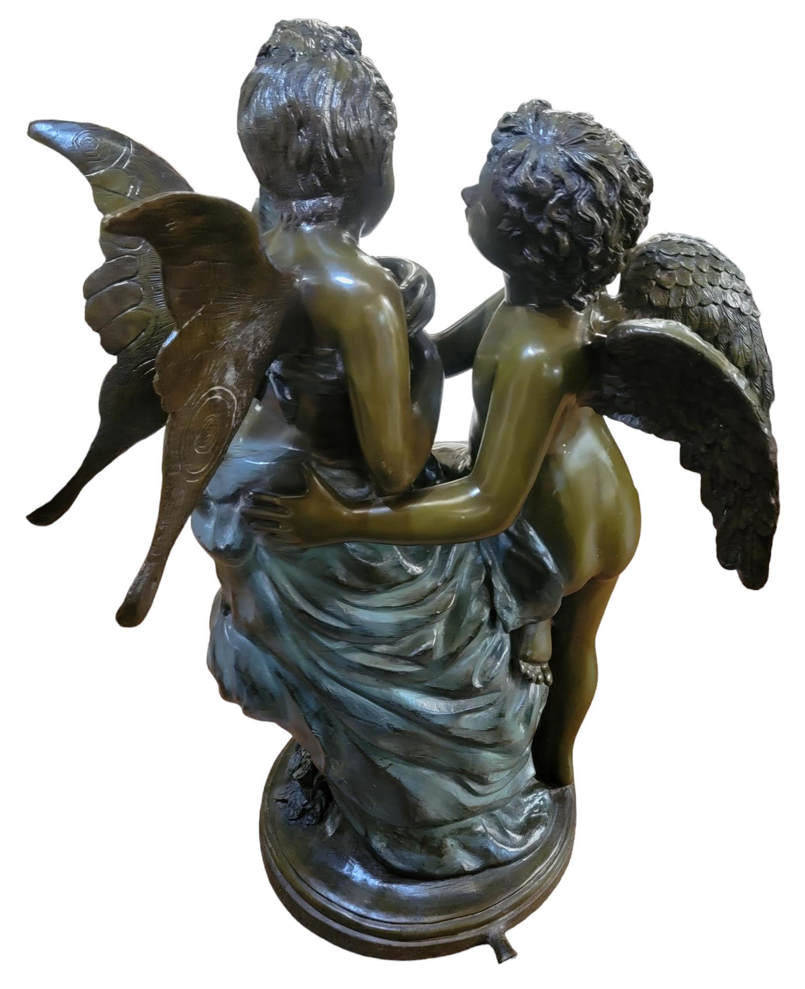 Greek Cupids Bronze Statue Rare.  This statue has 2 angels , male and  female. The angels are seemingly in love. The male Angel is staring in a gaze at the female angel who is seemingly shy. The essence of love is shared by this statue. There  is a