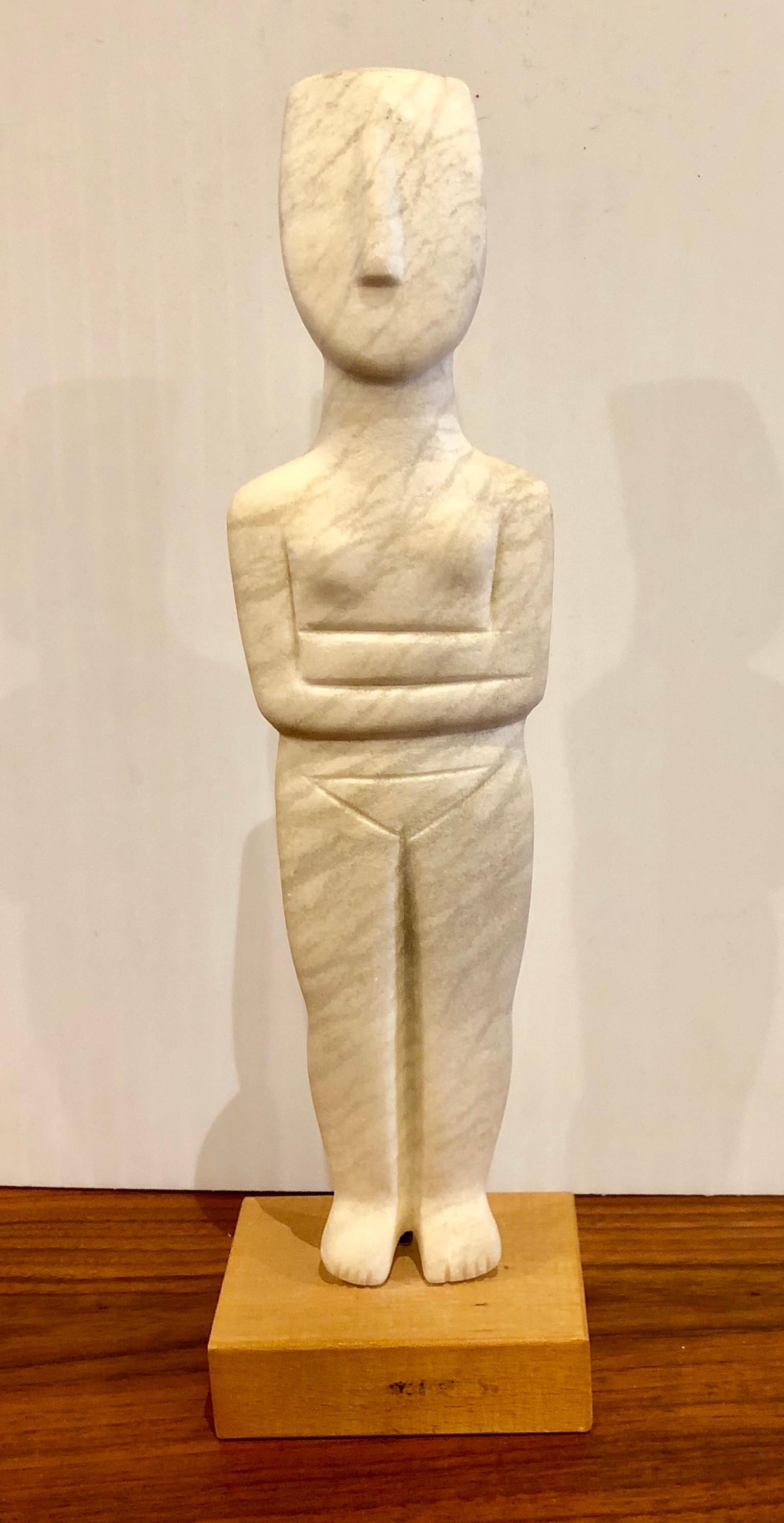 Greek Cycladic Alabaster sculpture on birch wood base, circa 1960s by Cycladic art handmade in alabaster hold by polished brass rod and birch wood base.