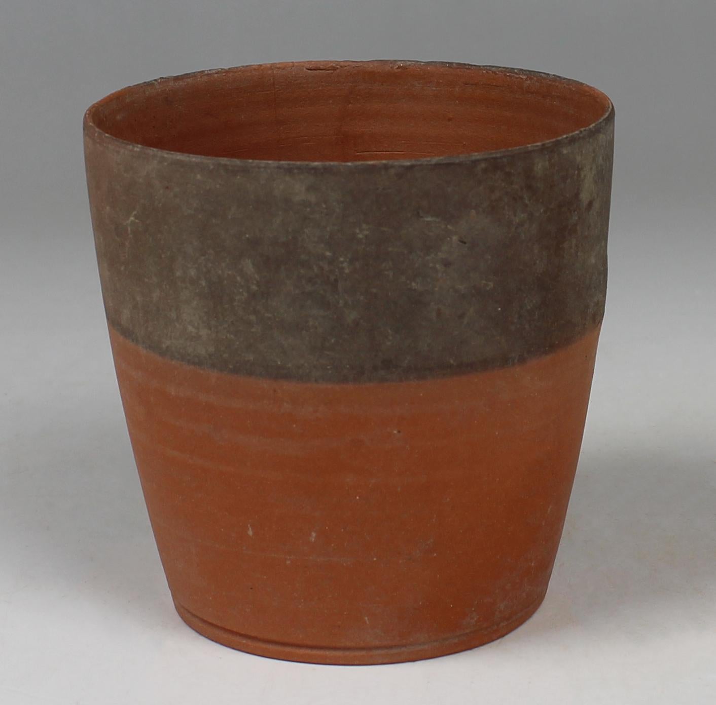 ITEM: Cylindrical beaker
MATERIAL: Pottery
CULTURE: Greek, Hellenistic Period
PERIOD: 3rd – 1st Century B.C
DIMENSIONS: 75 mm x 76 mm
CONDITION: Good condition
PROVENANCE: Ex German private collection, B. K., in Germany since before 1950.

Comes