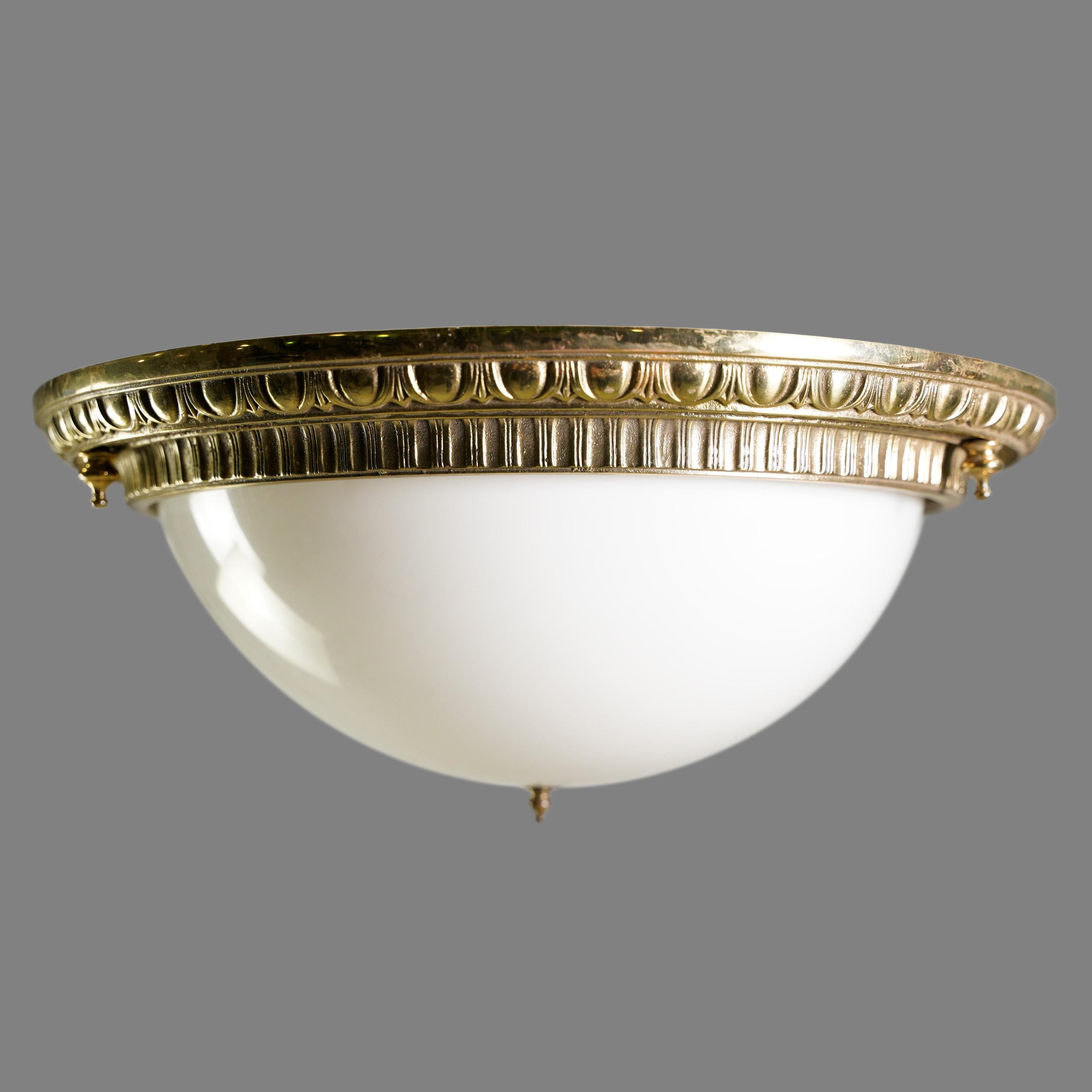 20th century Cast bronze flush mount done in a Classic Greek egg and dart design. The shade is white glass. Cleaned and restored. Please note, this item is located in our Scranton, PA location.