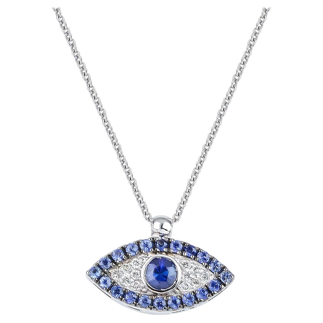 Collier pendentif œil de mort grec en or blanc 18 carats avec saphirs bleus et diamants