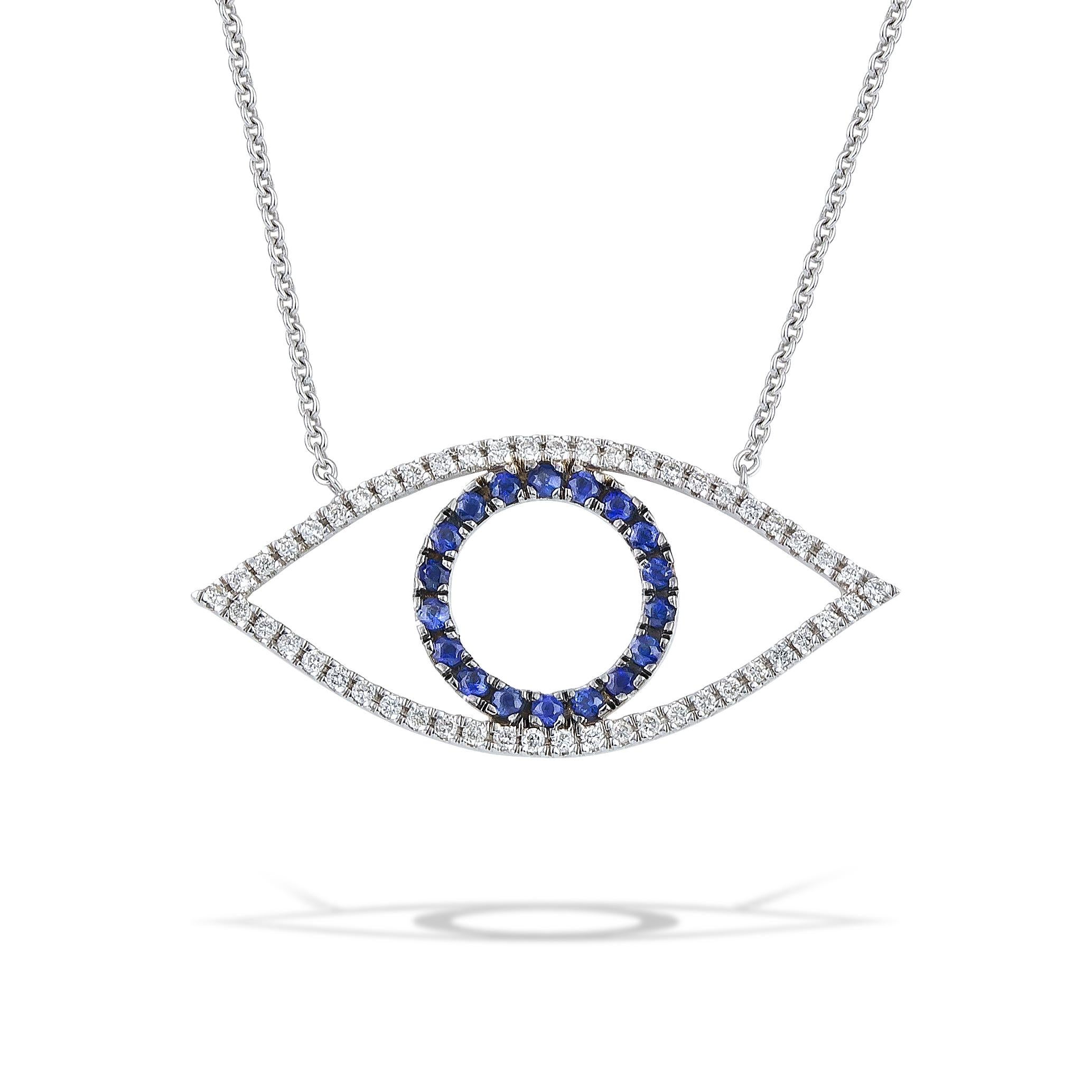 Greek Evil Eye pendant necklace handcrafted in 18Kt white gold with brilliant cut diamonds and blue sapphires.
In the greek culture the evil eye protects the one who wears it from the negative energy and stops the bad thoughts from affecting our